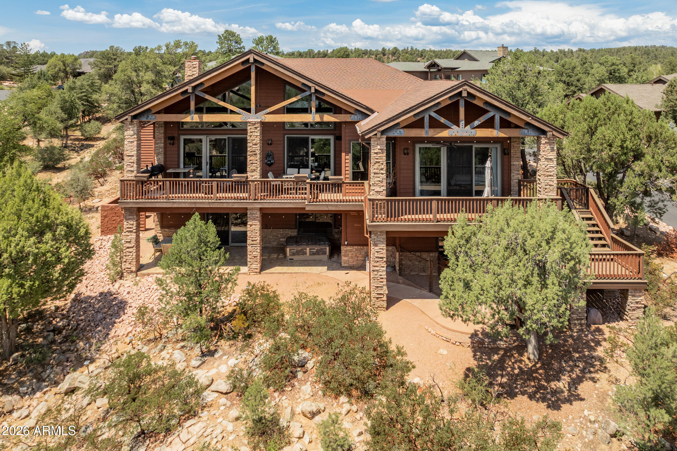 VIEWS VIEWS VIEWS

Nestled within the prestigious The Golf Club at Chaparral Pines, this exceptional mountain retreat offers the perfect blend of luxury, comfort, and breathtaking natural beauty. Featuring 4 spacious bedrooms, 4 well-appointed bathrooms, and approximately 3,454 square feet of thoughtfully designed living space, this home is ideal for both full-time living and a serene getaway.

Set against a backdrop of towering Ponderosa pines and panoramic mountain vistas, the property captures the essence of high-country living in one of Arizona's most sought-after gated golf communities, known for its scenic surroundings and top-ranked championship course. VIEWS VIEWS VIEWS

Nestled within the prestigious The Golf Club at Chaparral Pines, this exceptional mountain retreat offers the perfect blend of luxury, comfort, and breathtaking natural beauty. Featuring 4 spacious bedrooms, 4 well-appointed bathrooms, and approximately 3,454 square feet of thoughtfully designed living space, this home is ideal for both full-time living and a serene getaway.

Set against a backdrop of towering Ponderosa pines and panoramic mountain vistas, the property captures the essence of high-country living in one of Arizona's most sought-after gated golf communities, known for its scenic surroundings and top-ranked championship course. Inside, generous living areas provide a seamless flow for entertaining, while large windows invite in natural light and showcase the stunning views from nearly every room.

Whether you're relaxing on the outdoor living spaces, enjoying cool mountain air, or taking advantage of the club's premier amenities--including golf, dining, fitness, and recreation--this home delivers an elevated lifestyle in a tranquil, private setting.

Must see this property!