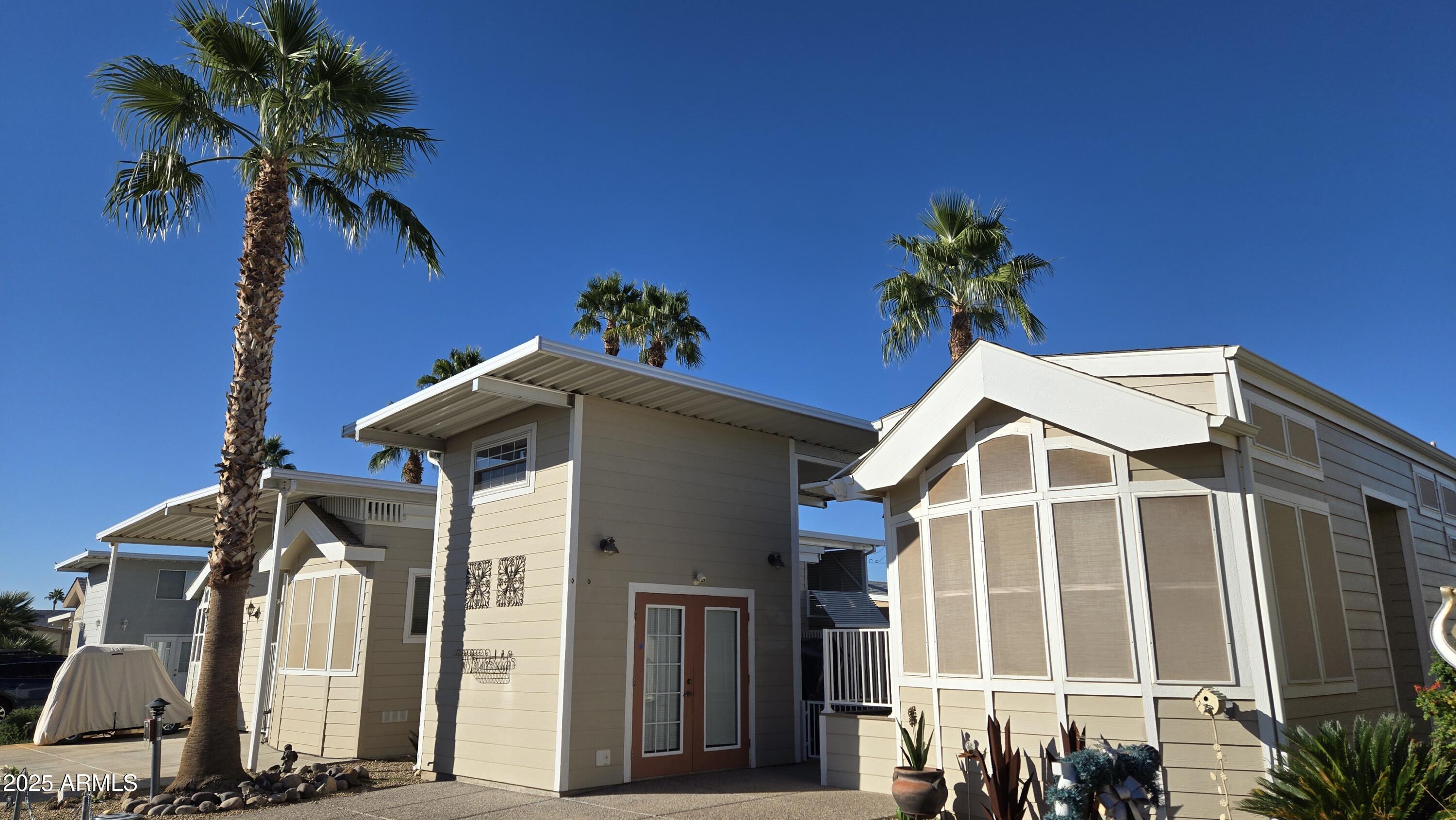 CAVCO 2011 Park Model 1 BR 1BA 2025 - New A/C Heat Pump 2024 - Stack W/D 2023 - Golf Cart Batteries 2008 - Golf Cart Fully furnished and move-in ready, Including Golf Cart. Shed with Loft, Half Bath, and built-in Cabinets. Patio with extended Awning, Water Feature, Barbecue, Privacy Fence. Don't miss this opportunity to enjoy the active adult lifestyle provided by this 55+ gated community where the lot is deeded to the owner.
