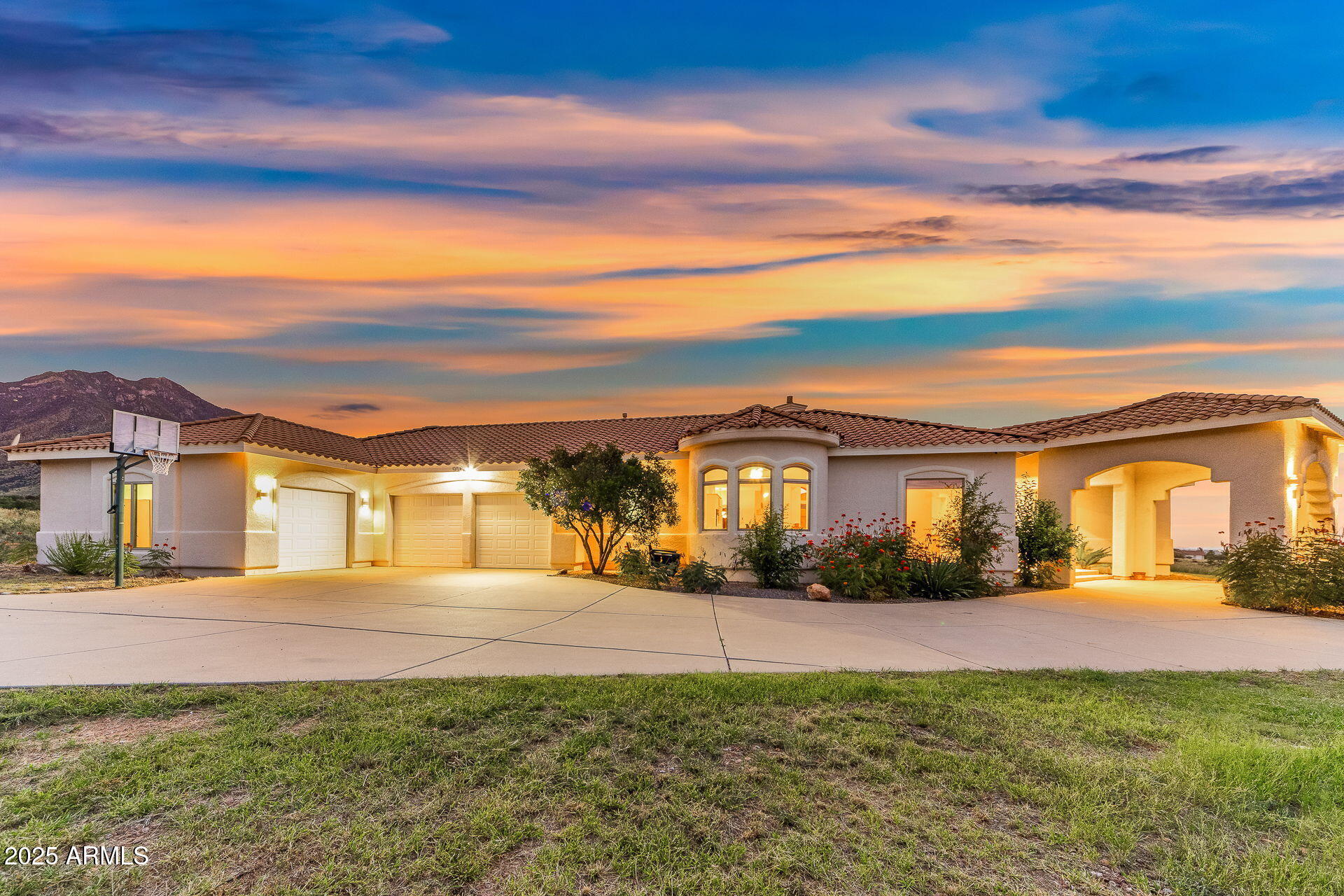 Welcome to 9566 S Swiss Ct in Hereford, AZ. Located at the end of a quiet cul-de-sac and surrounded by the natural beauty of the Huachuca Mountains, this custom-built 3,714 sq ft home offers privacy, space, and exceptional views.

Interior features include soaring ceilings, abundant natural light, multiple living areas, and a gourmet kitchen with custom cabinetry, ample counter space, and modern appliances. The primary suite offers a spacious layout with spa-like features and private outdoor access. Guest bedrooms are generously sized and thoughtfully positioned for privacy.

Property includes a full casita, ideal for guests, multigenerational living, or home office use.

Exterior highlights include mature fruit trees, a private lap pool, covered patio, and panoramic mountain views. Expansive 6-car garage provides ample storage and workspace.

Conveniently located near outdoor recreation, with easy access to Tombstone and Bisbee.
