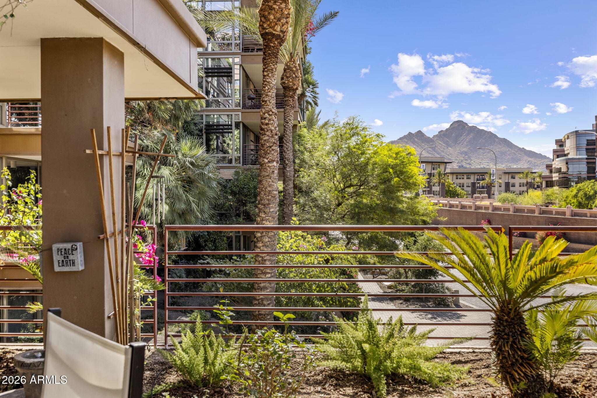 Wake up to Camelback Mountain. This 1 bed + den/2nd bed, 1.5-bath residence at Optima Camelview Village offers direct, unobstructed views of iconic Camelback Mountain from your private patio -- breathtaking at sunrise and sunset. The den is shown as a 2nd bedroom, perfect for guests or a home office. Beyond your door, the lifestyle is pure resort -- fitness center with pool, spa, and cold plunge, plus two outdoor pools and BBQ area. Walking distance to Scottsdale Fashion Square and the Entertainment District, with the Valley's finest dining, shopping, and nightlife at your doorstep. Storage unit available for an additional $15,000.