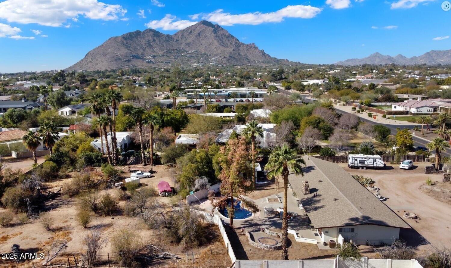 HERE IS AN OPPORTUNITY TO OWN A PIECE OF PARADISE. OVER 1 ACRE WITH CAMELBACK MOUNTAIN VIEWS. GREAT RANCH HOME READY FOR UPDATES OR START FROM SCRATCH WITH YOUR IDEAS. VIEWS & SERENITY WITH LIMITLESS POSSIBILITIES.

SEE DOCUMENTS TAB FOR AERIALS.
