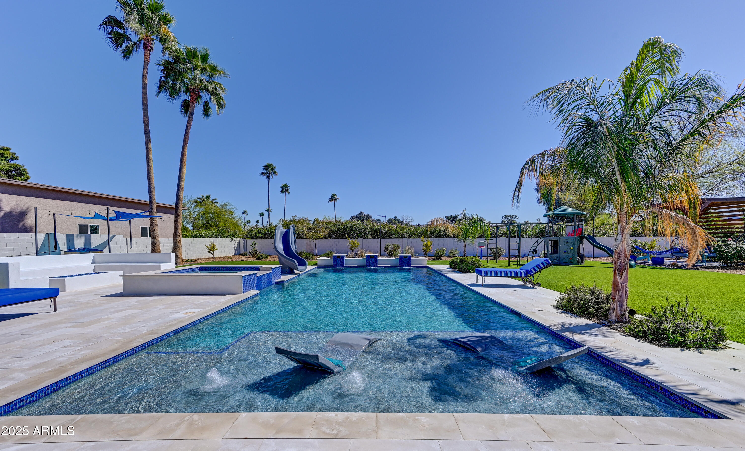 Best-Priced Newer Build in 85254 —Appraisal in hand--this 5 bedroom, 3.5 bath custom home on a half-acre+ lot is the best value newer build in 85254. Offering over 3,000 sq. ft. of thoughtfully designed living space, an oversized 3-car garage, and more than $300K in resort-style upgrades, this property is truly move-in ready. Enjoy a full-size pool and spa (not a play pool), built-in BBQ, expansive hardscape, lush landscaping, and a large covered patio perfect for year-round entertaining.
New homes in the neighborhood are quickly approaching $4M, giving you instant equity plus the flexibility to add two separate ADUs or expand the main home to fit your needs. Perfectly located between the new Paradise Valley Mall District and Kierland /Scottsdale Quarter, you'll have world-class dining, shopping, and entertainment just minutes away. With top-rated schools nearby and a premium half-acre+ lot, this home delivers the perfect balance of lifestyle, location, and long-term value.

Skip the delays, stress, and rising costs of new construction this one is turnkey and ready today.