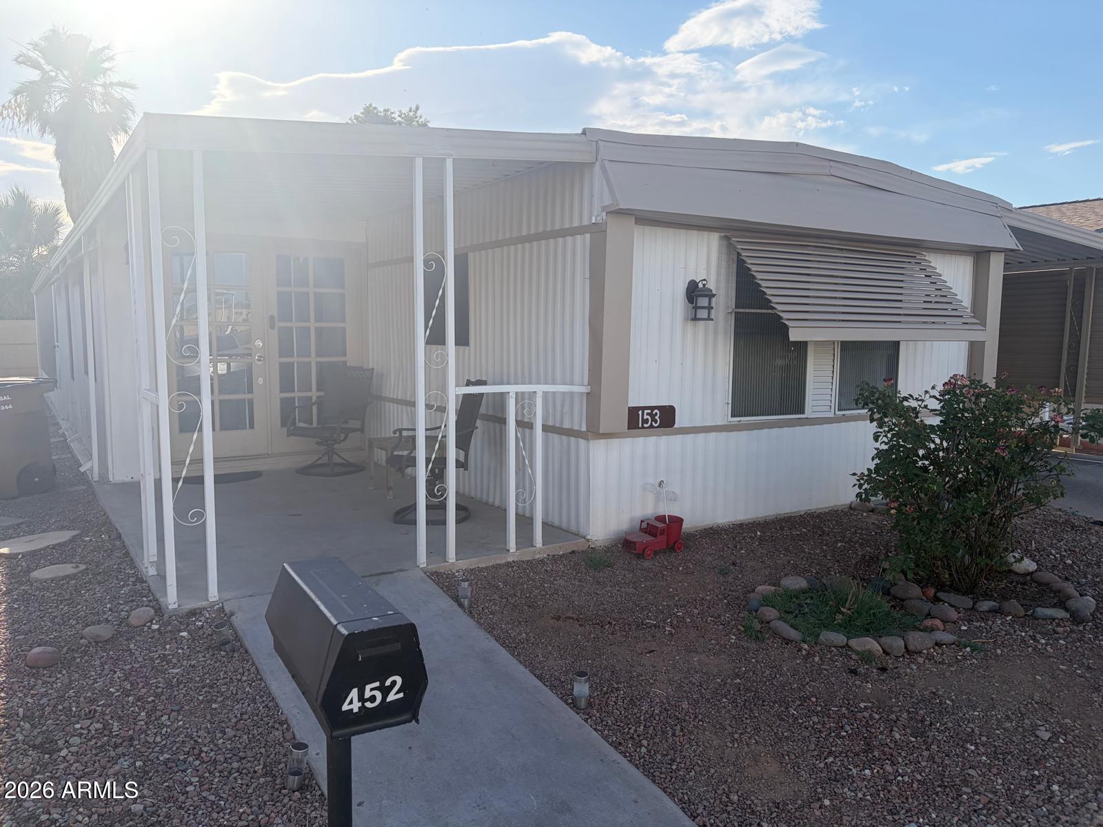 Beautifully remodeled manufactured home featuring 2 bedrooms, 2 bathrooms, and a bonus room ideal for a home office, hobby room, or additional living space. This move-in ready home offers an open floor plan with a spacious living area flowing into the upgraded kitchen, complete with modern cabinetry, updated countertops, and ample storage. Interior upgrades include updated flooring, remodeled bathrooms with stylish finishes, and spacious bedrooms, including a primary suite with a large closet and private bath. Exterior features include covered parking, low-maintenance landscaping, and a large storage shed/workshop area. Well-maintained and ready for its next owner!