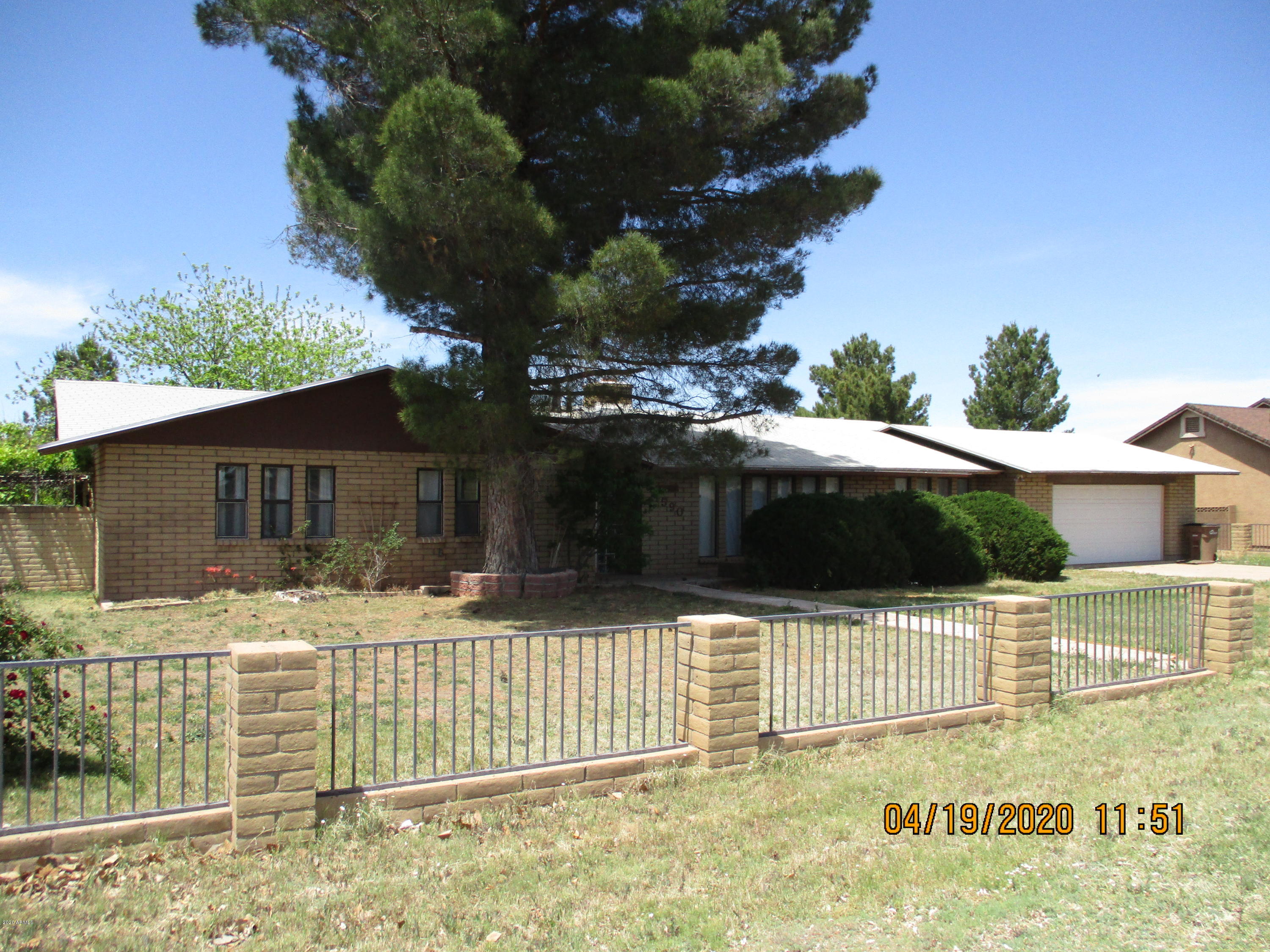 Super Family Home with great curb appeal located across the street from a church/park. The home has a large basement with lots of storage and makes a great kids play area. It stays cool in the summer and warm in the winter. Main Level has a formal living room and dining room. There is a fireplace in the family room just right off the kitchen. There is also a full length Arizona room that overlooks the backyard. If you need a workshop, bring your tools because you have the space for those.  Home needs some TLC to restore it to its grandeur of old, but it will be worth it. Schedule your private showing today.