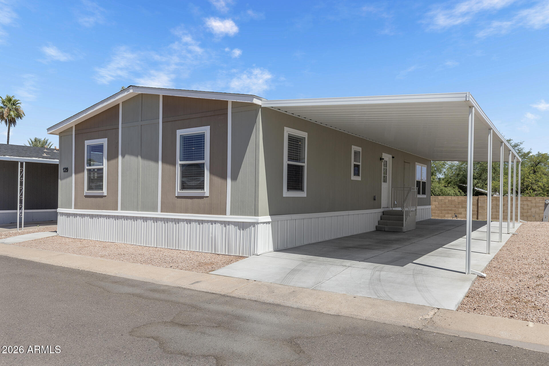 Move-in ready and beautifully designed, this 3-bed, 2-bath mobile home with a den offers comfort and style in a welcoming community! The spacious open-concept living area creates an inviting atmosphere. The modern kitchen is a standout feature, showcasing stainless steel appliances, a center island, breakfast bar, and TONS of storage space.  Thoughtfully maintained and ready for immediate enjoyment, this home delivers easy, comfortable living from the moment you arrive. Residents also enjoy fantastic community amenities including a clubhouse, relaxing spa, and more--adding even more value to this wonderful opportunity. Don't miss your chance to own this welcoming home!