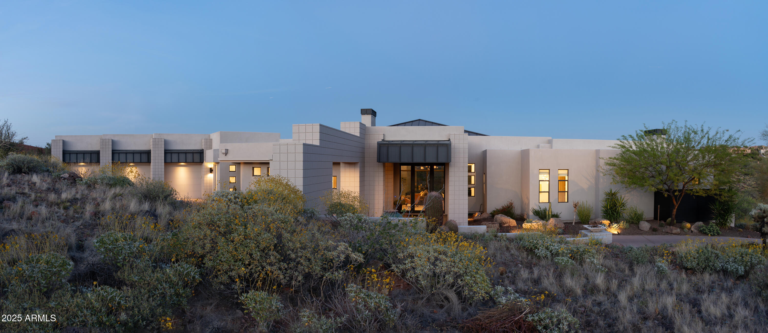 Magnificent Views of the Firerock Golf Course and Four Peaks define this turnkey, remodeled, contemporary home located along the Scottsdale-Shea corridor. Situated on a 2+ Acre peninsula Lot, the home is a restful and private escape. Walls of glass line the Living Room, Kitchen-GreatRoom & Primary Suite, emphasizing the changing light's effects on the views throughout the day. The interior was thoroughly remodeled in 2018-19 with an Attached Guest House added.