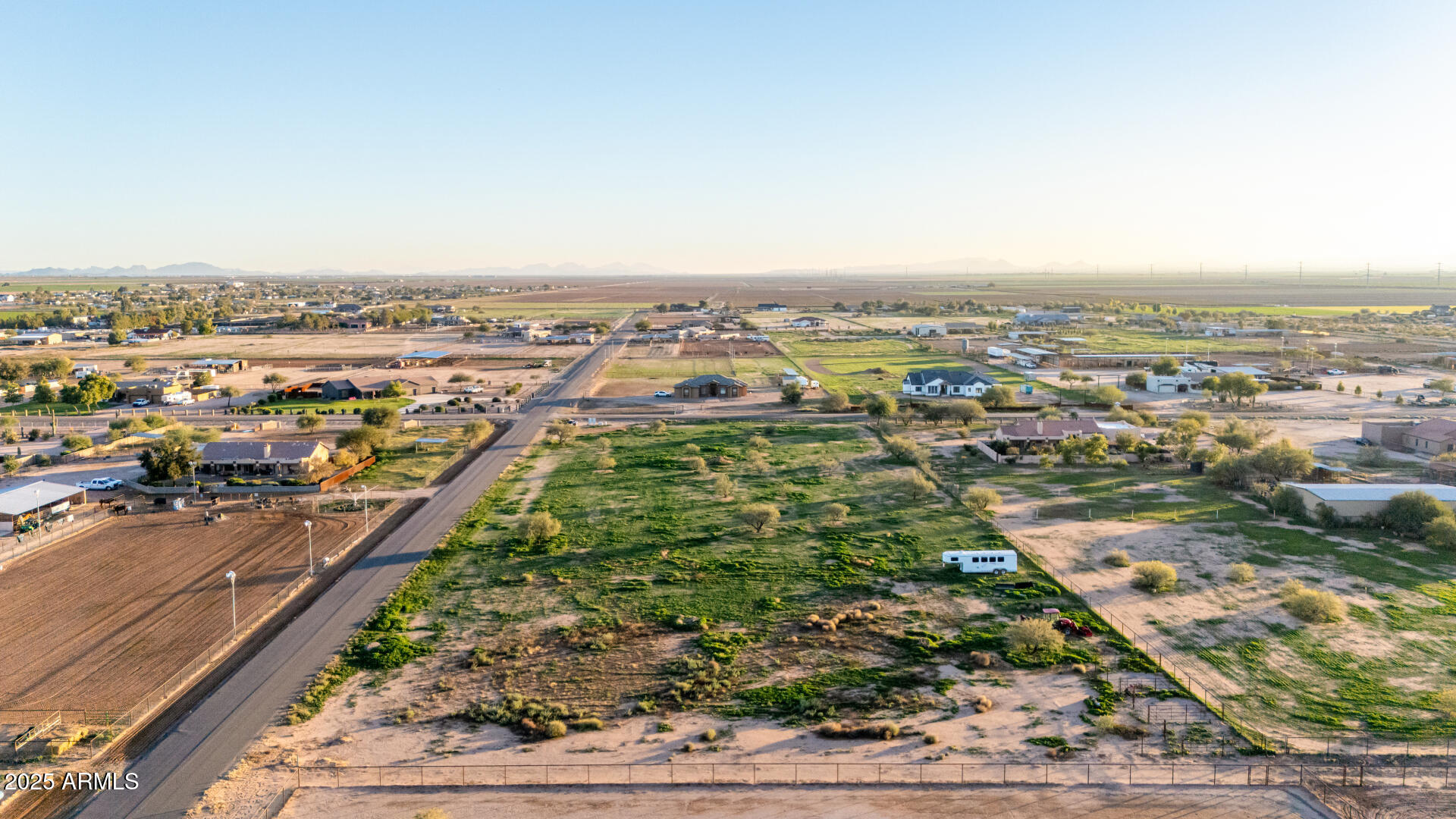''The Arizona Heartland'' Offering Country Living,Custom Home Neighbors w/ City Convenience's just 12 Minutes Away!This 3.5 Acre,N/S Exposure,Level,Corner Lot Displays 3 Horse Corrals & Is Located In The High Demand,Custom Home,Horse & Livestock Friendly Community of Santa Rosa Ranchos 3;Boasting Paved Roads & City Water,No HOA/CCR's Apply. A Tranquil Community Of 65 Premiere Lots & Nearly Built Out;Perfectly Positioned Between Casa Grande & Maricopa,Near I-10 & I-8 Freeways.Therefore,Less Than An Hour To Both Large Airports, & Popular Arenas Horse Shoe Park (Queen Creek),Welcome Home Ranch(Gilbert/Chandler) 20-30 Minutes of Rodeo/Show Parks in CG & Maricopa,Too. This Neighborhood Is Sure To Steal Your Heart & Welcome Your Dream; A Custom Home Accented w/ Your Dream Arena or Workshop!