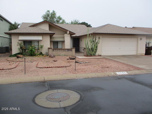 Fabulous Fountain of The Sun gated and guarded senior community offering golf courses. fountain, tennis, clubhouse and restaurant plus a spacious fully tiled home with ceiling fans, large rooms throughout , an Arizona Room, garage and nicely landscaped yard.