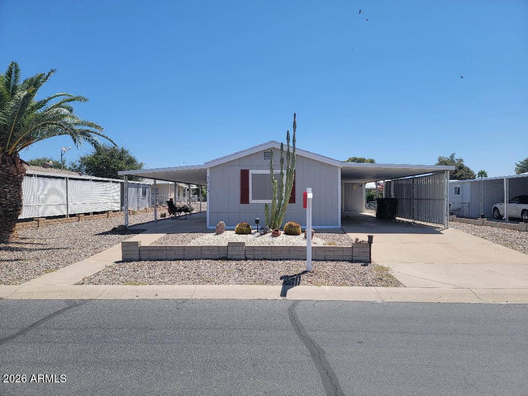 This is a beautiful home that is close to everything! 2 bedrooms (split floorplan) 1.5 baths. This home will be furnished! Brand new beautiful roof put on 9/2025! New cabinets in kitchen and laundry area, new Corian counter tops in kitchen, new counter microwave. New flooring, and windows installed. Very well maintained home with new paint, new lighting and much more! Fenced yard with 2 sheds, great patio area and large carport with sunshades for privacy. 3 fruit trees. The home was just power washed and very clean inside and out! This home won't last long!