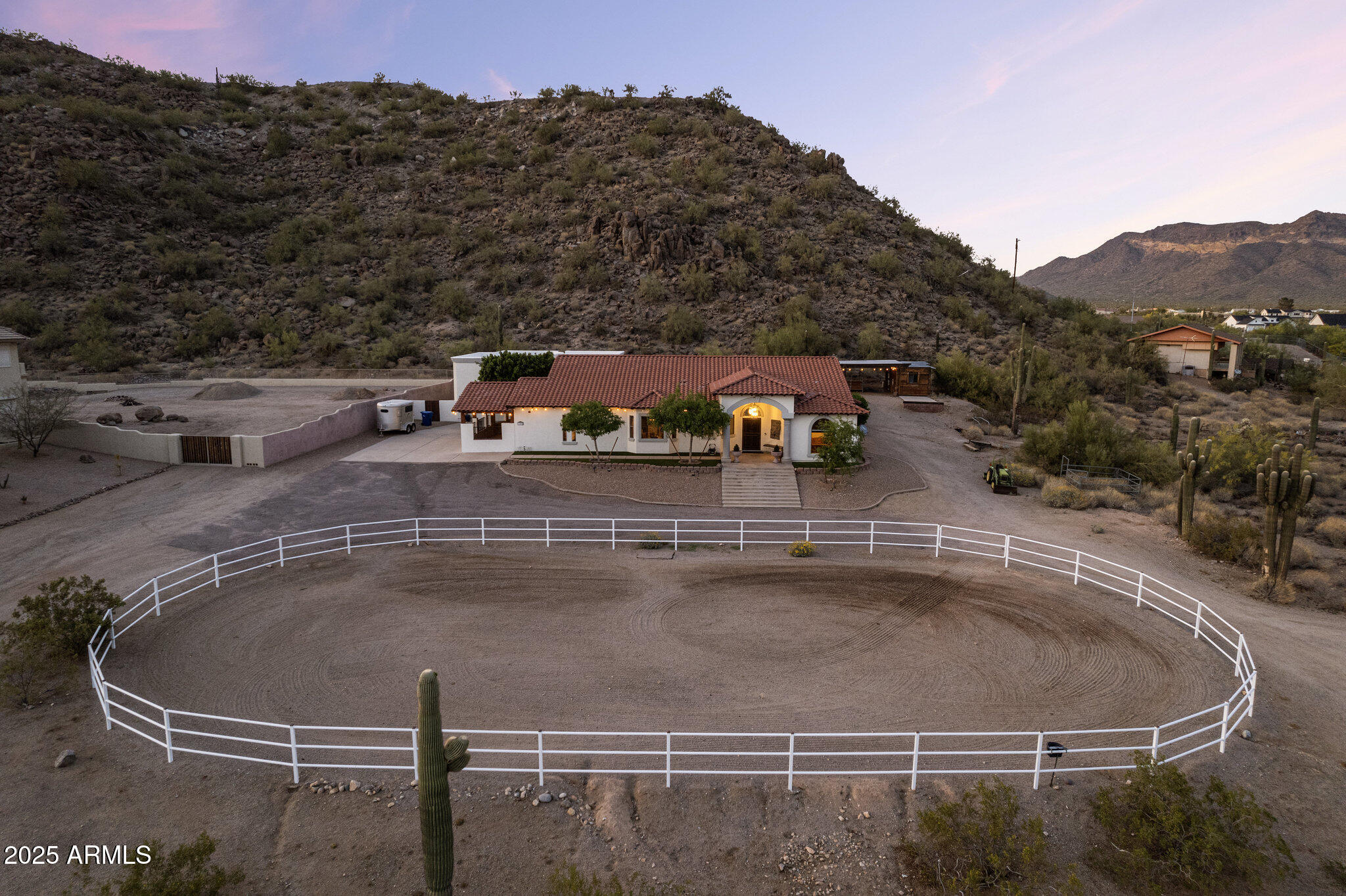 Welcome to your stunning custom home w/ private casita; designed for space, privacy, & elevated desert living. Situated on just under 2 acres & backing to a preserve, this property offers serene surroundings, unobstructed views, & unforgettable sunsets from the rooftop deck. Horse privileges include stalls & arena, while the expansive setting allows for flexibility & lifestyle freedom. Featuring 3 bedrooms, 2.5 baths, office, separate family & entertainment rooms & seamless indoor-outdoor living. Large covered patio & pool create an inviting space to relax or entertain. The detached casita offers an open floor plan w/ 1 bedroom, 1 bathroom, full kitchen, & preserve views—ideal for guests or multigenerational living. Located near the Usery Mountain trailhead w/ convenient freeway access.
