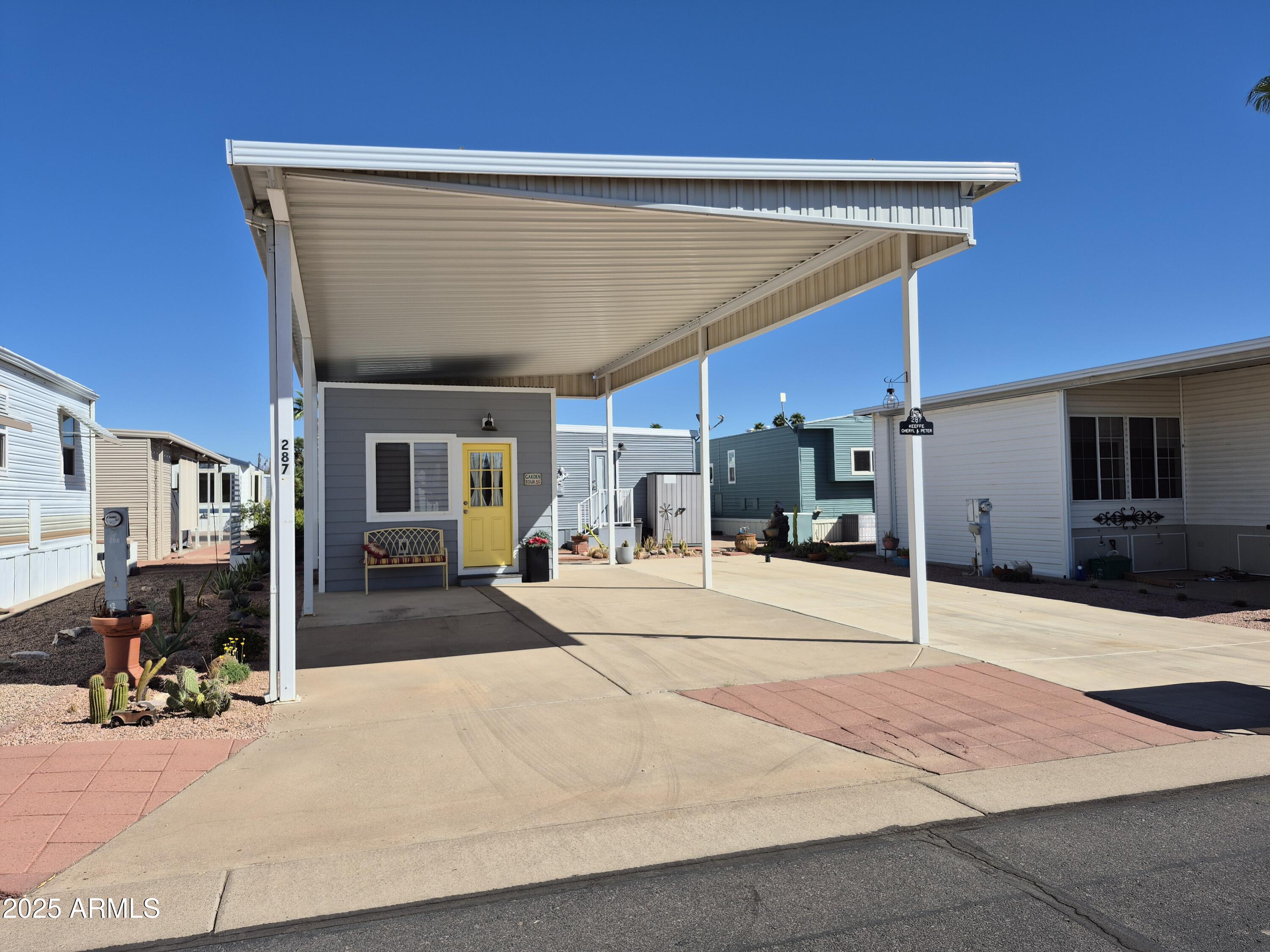 This is one of only a few RV lots left and it is beautifully landscaped and fully cemented in Carriage Manor Resort, an active 55+ adult community where you OWN THE LAND! This lot has an amazing shed that was built on palettes so that it can be easily moved. Inside it is very tastefully painted and even has a ceiling fan. You have to see this one. Carriage Manor has 24/7 onsite security, a heated saltwater pool/spa, fitness facility, Tennis, Pickle ball, Golf Club, Billiards, Lapidary/Silversmith, Sewing, Wood shop, Bingo, Dances parties & many more activities & amenities.