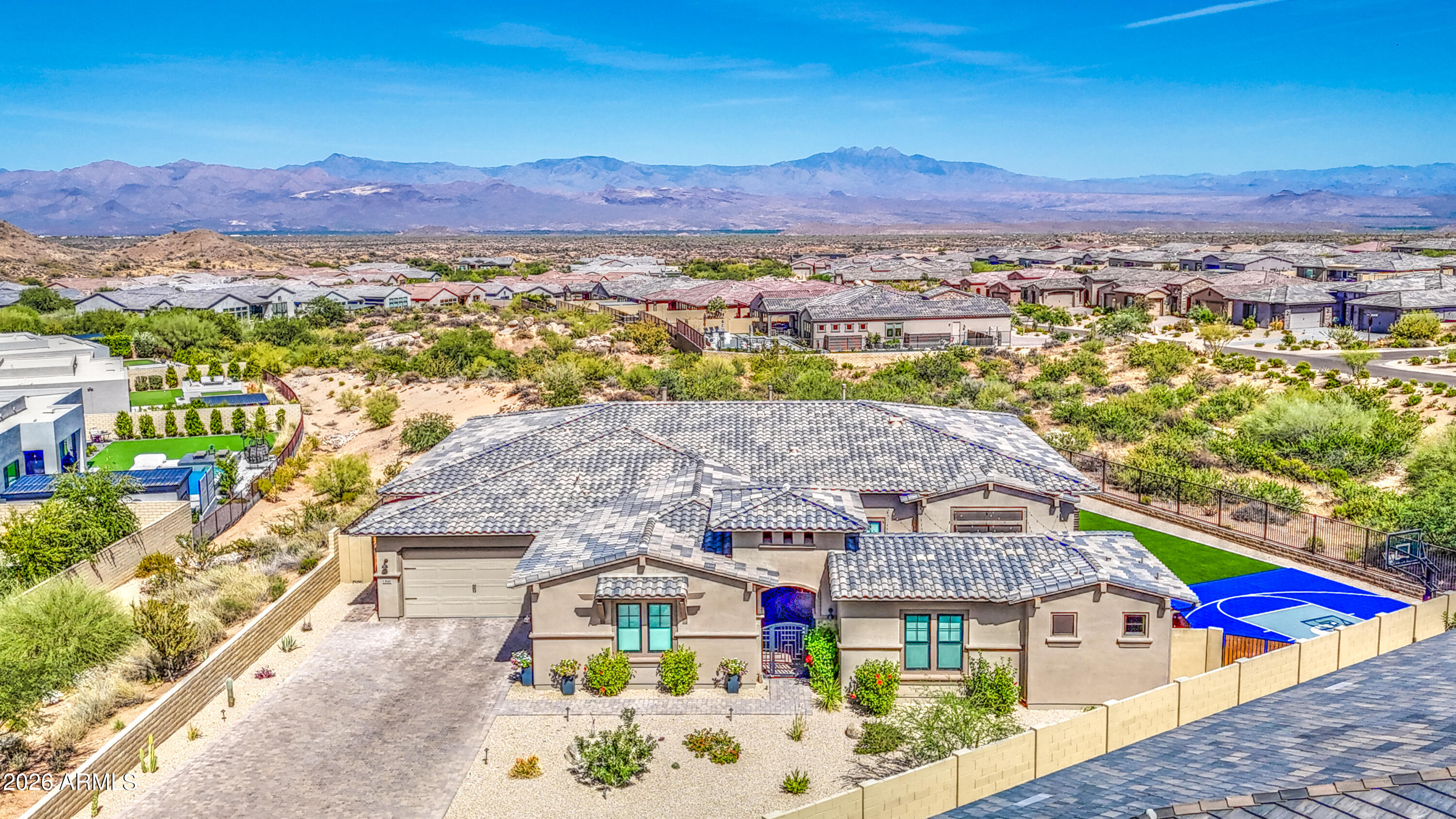 This 4,100 sf single-level home with a detached casita sits on a .47-acre lot with stunning 360° mountain views offering true luxury living with no expense spared. 

A private courtyard separates the casita from the main home, creating a true multi-generational or guest retreat. 

Inside, the open-concept split floor plan features two en-suite bedrooms, a dedicated office, media room, and chefs kitchen enhanced by a wide range of luxury upgrades and finishes. 

The backyard delivers a resort-style retreat, featuring a sparking pool and spa, expansive travertine patio, outdoor kitchen, pergola, fire pit, putting green, and basketball court. Ideal for entertaining at any scale. 

Take advantage of like-new construction in of Scottsdale's premier communities.