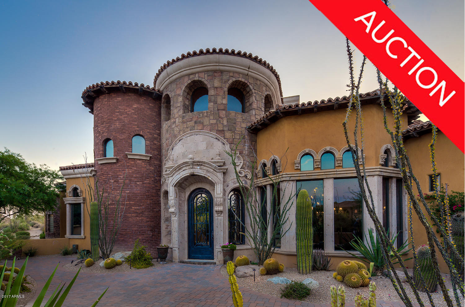 LUXURY AUCTION - SELLING WITH NO RESERVE – DEC. 16TH. Welcome to Chateau Crest, an enchanting Tuscan estate set amongst the rolling hills of Troon North Golf Course in Northern Scottsdale, Arizona. This exclusive luxury residence offers endless amenities from its gourmet kitchen, to the expansive outdoor space. Showcasing spectacular mountain, golf course, and city light views from the negative-edge heated pool with spa and waterfall, multiple patios and balconies, this is your very own private oasis. The opportunities are truly limitless at Chateau Crest. A RARE opportunity for you to own at YOUR price!