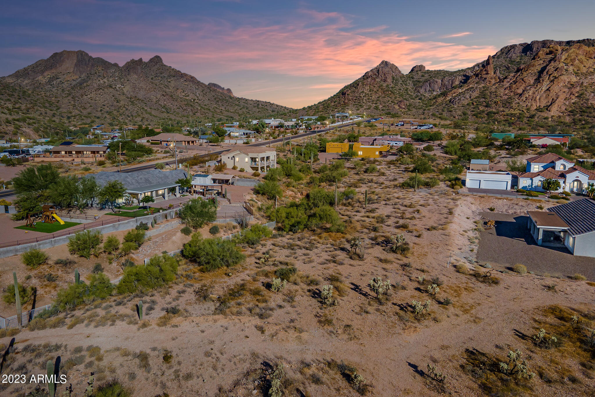 This 1.25 acre parcel in Apache Junction has ONE-OF-A-KIND MOUNTAIN VIEWS - Superstition Mountains AND Goldfield Mountains! Custom Home area, Zoned CR-1A for site-built homes only. Property includes access to WATER, Shared Well Agreement in place. Seller recently put in driveway w/ CULVERT - Very private driveway back to buildable area. NO FLOOD ZONE! NO HOA! HORSE PROPERTY! Plenty of room for your Trucks, Toys, RV's, Workshop, or Guest House/Casita. Property is just minutes from the Tonto National Park Entrance and the US-60! Canyon & Saguaro Lakes nearby, with easy access to hiking trails, biking trails, and horseback trails. Boundary Survey is available. Parcel is ready for development - land is level and READY TO BUILD. SELLER MAY CARRY!