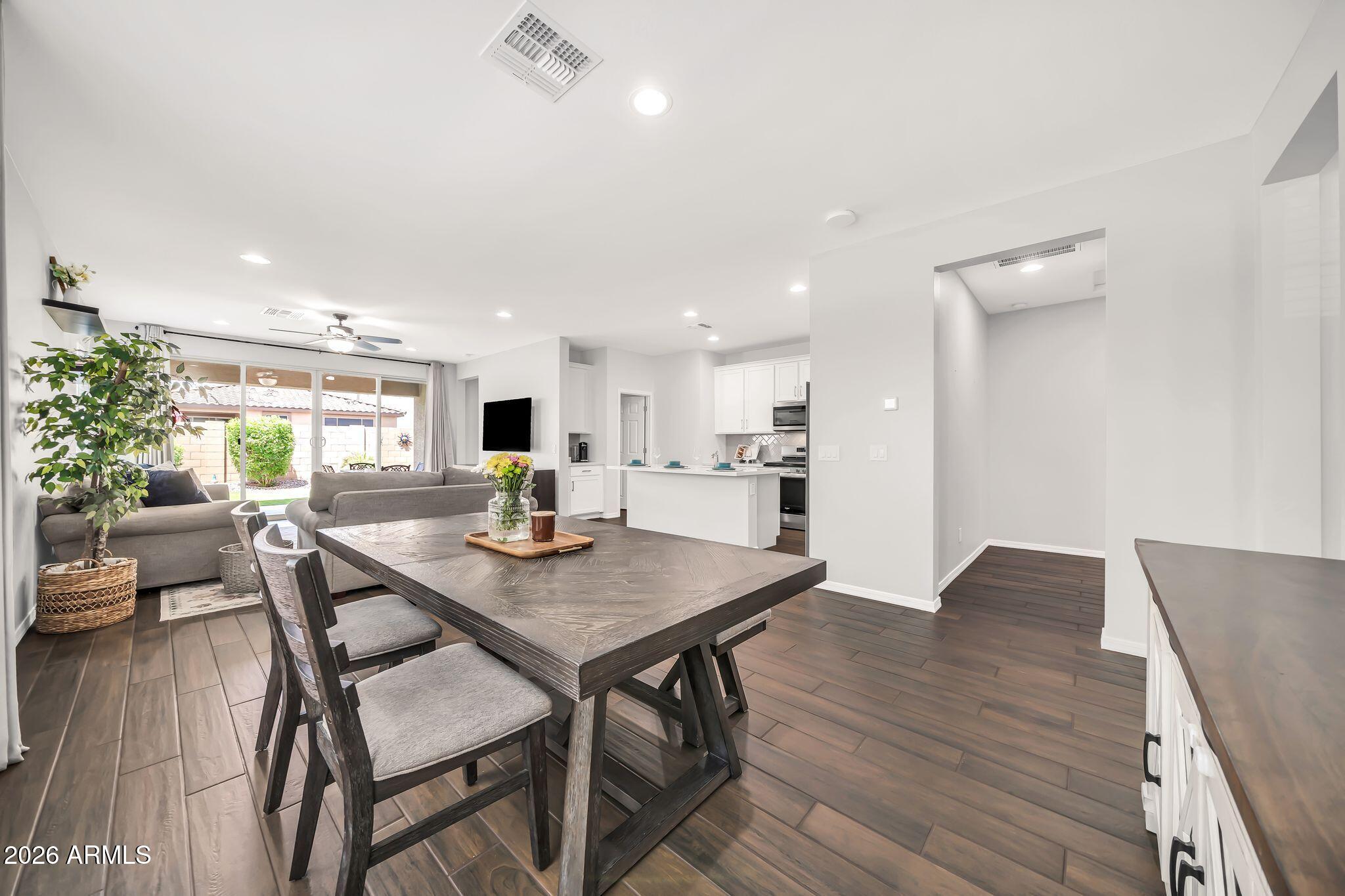 Escape the city and discover the quiet comfort of Alamar! A new community designed for the good life. Gather with friends at the community pool and take family walks through Alamar's scenic parks, playgrounds, and trails. All within an open space that feels warm, inviting, and connected. Completed in 2022, this single-level home offers modern living with a flexible 4th room currently used as a children's playroom that can easily be enclosed. Located near Loop 202, shopping, dining, and outdoor recreation, this home blends everyday convenience with the peaceful lifestyle you've been searching for. Come see your new home today!