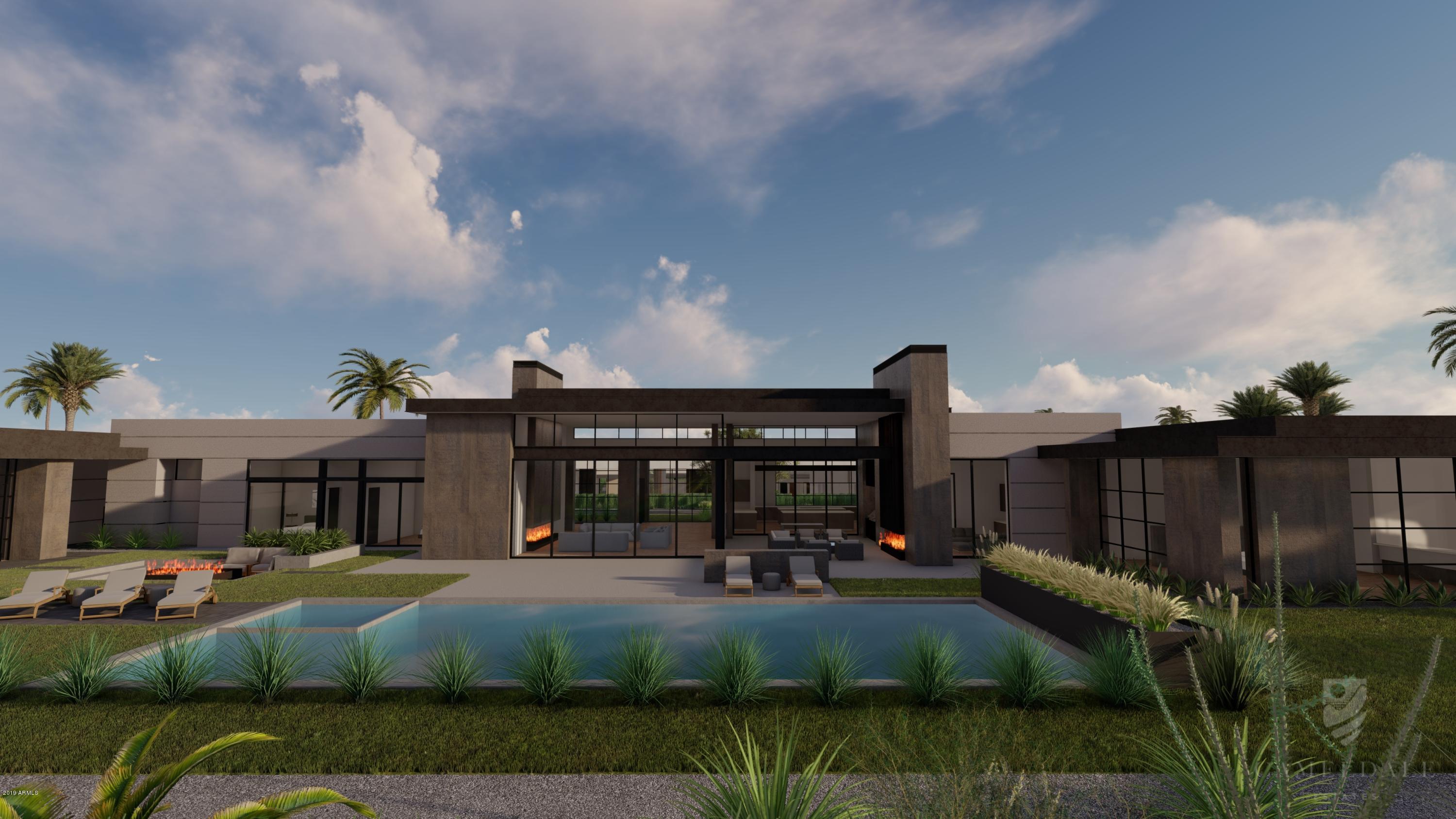 This is the pinnacle of Paradise Valley Real Estate. Located in the heart of Paradise Valley, Arizona this jaw dropping home is part of 11 high-end gated estates. From the second you drive down the street you are transformed. Well-manicured lush landscaping and palm tree lined streets tie the estates together while mature green hedges provide the privacy you desire. Floor to ceiling walls of glass capturing the Camelback MTN views and creating endless livable space inside and out. Fit and finishes like nothing you have seen before. Countless views, clean lines with an organic modern feel. Split floorplan, private den, exercise room, pool/spa, plus a 2 room guest house. Inspired by an iconic architect and built by Bedbrock Developers, designed Drewett Works and finished by Ownby Design.