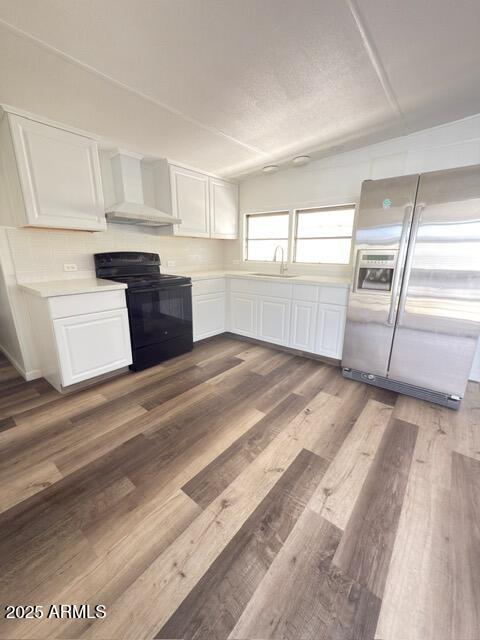 Welcome to this charming 2-bedroom mobile home in the Friendly Village of Orangewood! The exterior boasts a tandem carport, an access ramp, and a welcoming front porch. Inside, you'll find an open layout with vaulted ceilings, a soothing palette, and warm wood flooring. The kitchen comes with solid surface counters, crisp white cabinetry, and built-in appliances for a seamless cooking experience. Both bedrooms offer a cozy and private retreat. You'll also find a laundry room for added convenience. The storehouse provides a space for a workshop or extra storage. Enjoy resort-style amenities including a pool, Jacuzzi, golf course, fitness center, billiard room , bounce ball, bingo, dance floor, regular community events and more. Great location near shopping, dining, and highways , ,perfect for active adult living! Priced to sell , make it yours now !