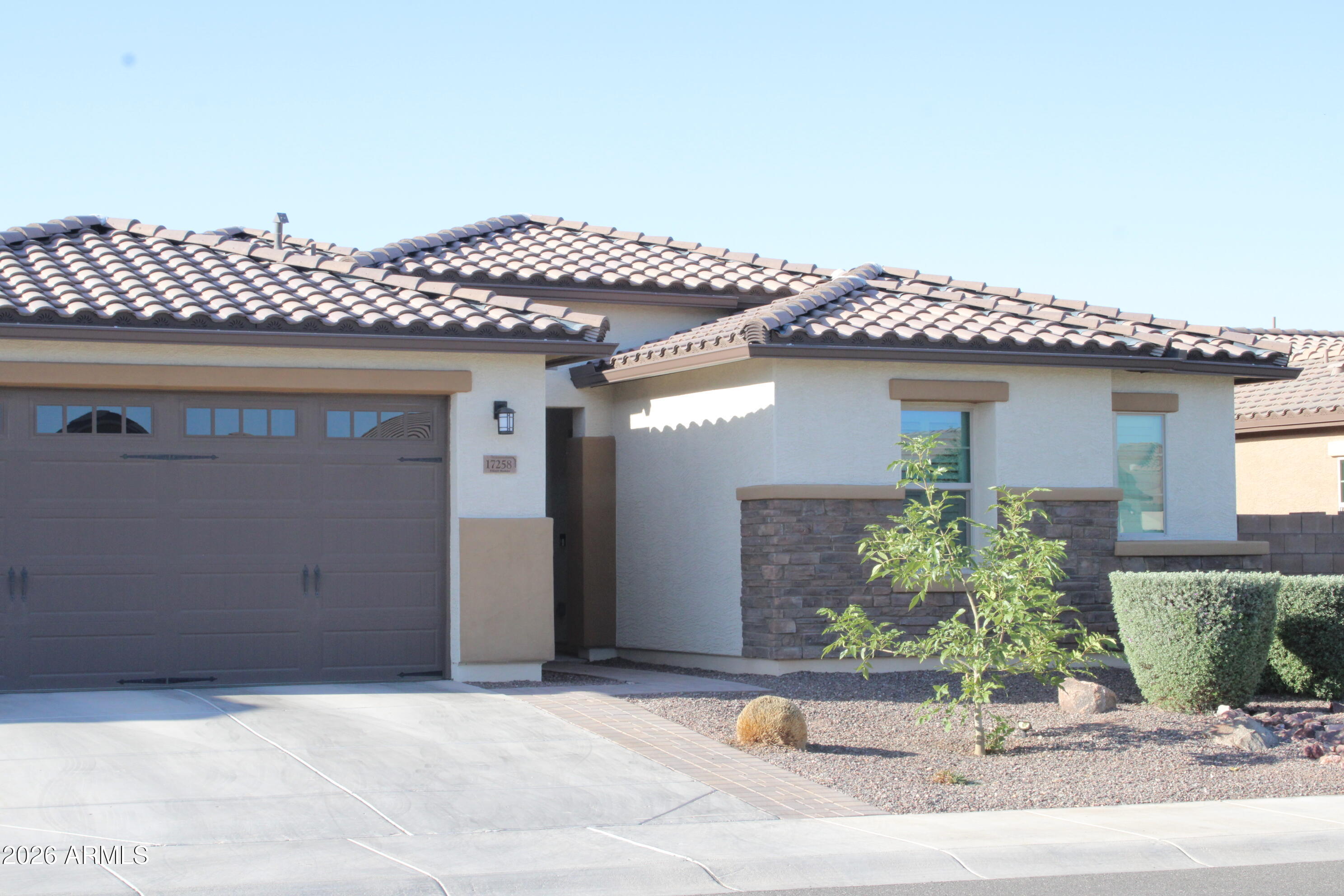 Beautiful move-in ready home in the highly sought-after Granite Vista community! This spacious 4 bedroom, 3 bathroom home offers an open and functional floor plan with modern finishes throughout. The upgraded backyard is designed for low maintenance and entertaining with artificial turf and a custom pergola. Additional features include custom window coverings, upgraded ceiling fans,...north/south exposure, spacious living areas, custom cabinets and shelving in garage and a well-appointed kitchen perfect for everyday living. Conveniently located near Loop 303, parks, shopping, dining, and top-rated schools. Better than new with completed backyard upgrades and window treatments already done!