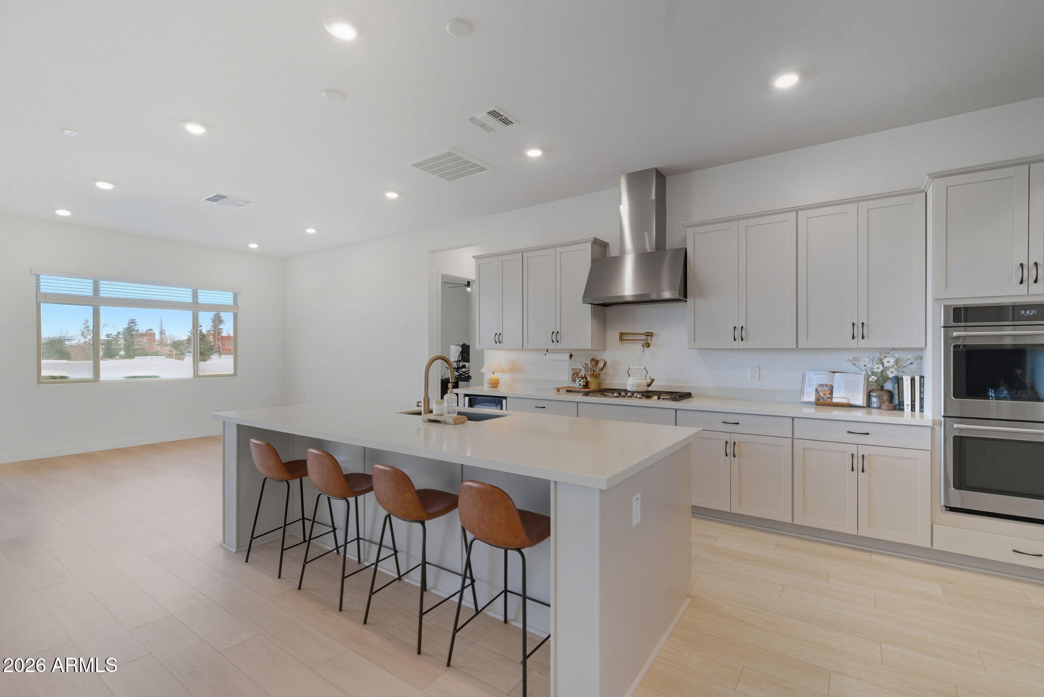 What an incredible premium hillside lot in the beautiful Whispering Hills neighborhood at the base of South Mountain! This Pinnacle Floorplan has over 3600 SF w/4 Bedrooms & 3.5 Bathrooms. Split Bdrms & Home Office. Seller paid for all the right PREMIUM features... Soaring 12' ceiling w/CORNER Sliding Glass Door out to patio, Modern Iron Front Door, Added Exercise/Bonus Rm, Upgraded Flooring, Custom Tile Master Shower w/Raincan Head & Frameless Walk In enclosure. Gourmet Kitchen includes upgraded Cabinets & Quartz Countertops, Beverage Center, Premium Cafe' GE Appliance Pkg: 36'' Gas Cooktop, Double Ovens & Commercial S/S Vent. Champagne Bronze TOUCH Kitchen Faucet & Pot Filler. Baths have Matte Black Fixtures w/raised Vanities & Rectangle sinks for a modern look. Make this your new HOME! Added Upgrades:

12" Ceiling Height in Great Room       
Contemporary Iron Front Entry Door w/Lever Matte Black Hardware   
Finished Bonus Exercise/Game Room 
Extended Corner Sliding Glass Door
Upgraded Aristokraft Cabinets Throughout
Grade 5 Quartz Countertops
Cafe' GE Appliance Package
36" Cafe' Gas Cooktop
Champagne Finish Pot Filler
Super SingleBowl Kitchen Sink
Champagne Finish TOUCH Faucet
Beverage Center
Commercial 36" S/S Vent
Custom Shower Tile Surround w/ Frameless Walk In Shower Enclosure
RainCan Shower Head with Watersense & Sep Valves
Raised Vanities all Baths w/ Rectangular Vanity Sinks
Matte Black Bath Plumbing Fixtures
Soft Water System
Gas Line Stub out for Backyard
Premium Oversized Hillside Lot (.46 Acre)
Insulated Garage Door
Prewire for Pendant Lights
Ceiling Fans & Prewire w/Sep switch for Fan & Light
Full house Window Blinds 
Floor outlet in Great Room 
Additional Outlet
10' RV Gate
   

Standard features are: 

400 AMP Electrical Panel

SMART Features: Switches, Thermostat, Front Entry Door, Doorbell & Garage Door Opener.   LED Disc Lighting per Plan, USB Port @ Kitchen & Primary Suite with Duplex Charger.

Energy & Earth Friendly features:
LEED Certified Home, 16 Seer Lennox Air Conditioner System, Fresh Air Intake & R8 Flex Duct System, Tankless Gas Water Heater, Low E Dual Pane Vinyl Frame Windows, Sprayed Cellulose Insulation in Exterior Wall, Low Water Plumbing Fixtures & Toilets, Post Tension Foundation System.

All Interior paint to be Low VOC