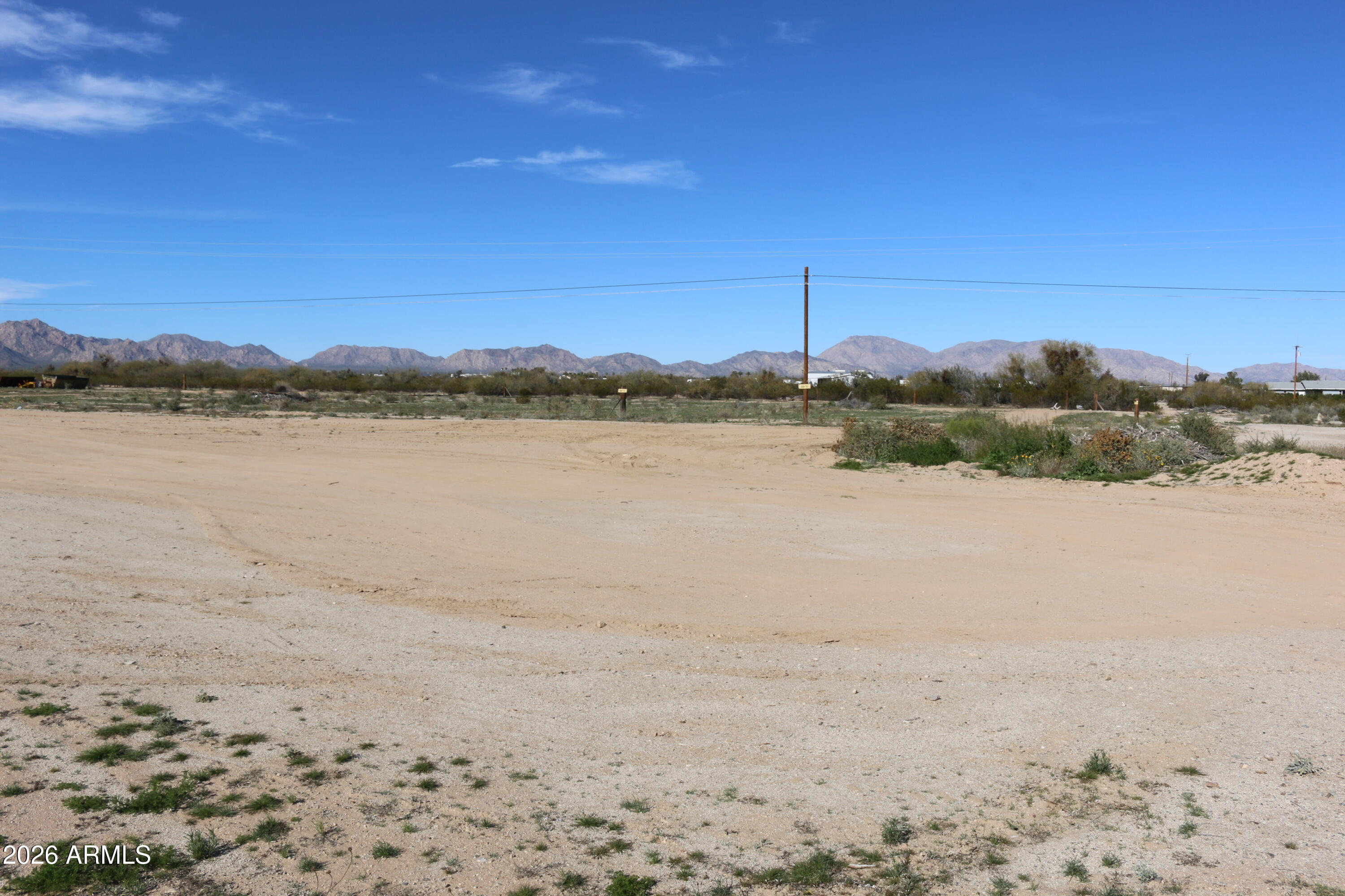 Discover an exceptional opportunity to own a flat, build‑ready lot just moments from the desirable Indian Hills community and not in a subdivision. This property is priced to sell and offers the ideal blend of convenience, privacy, and Arizona charm.
Essential utilities are close by, including electric, water, and natural gas, making future development smooth and cost‑effective. With no washes to cross, access is easy and reliable year‑round.
Located in the welcoming Salome community, this parcel showcases the very best of desert living: breathtaking sunrises, glowing sunsets, and sweeping views of the Arizona mountains. Whether you're looking to build a winter retreat, full‑time residence, or investment property, this lot delivers exceptional value.