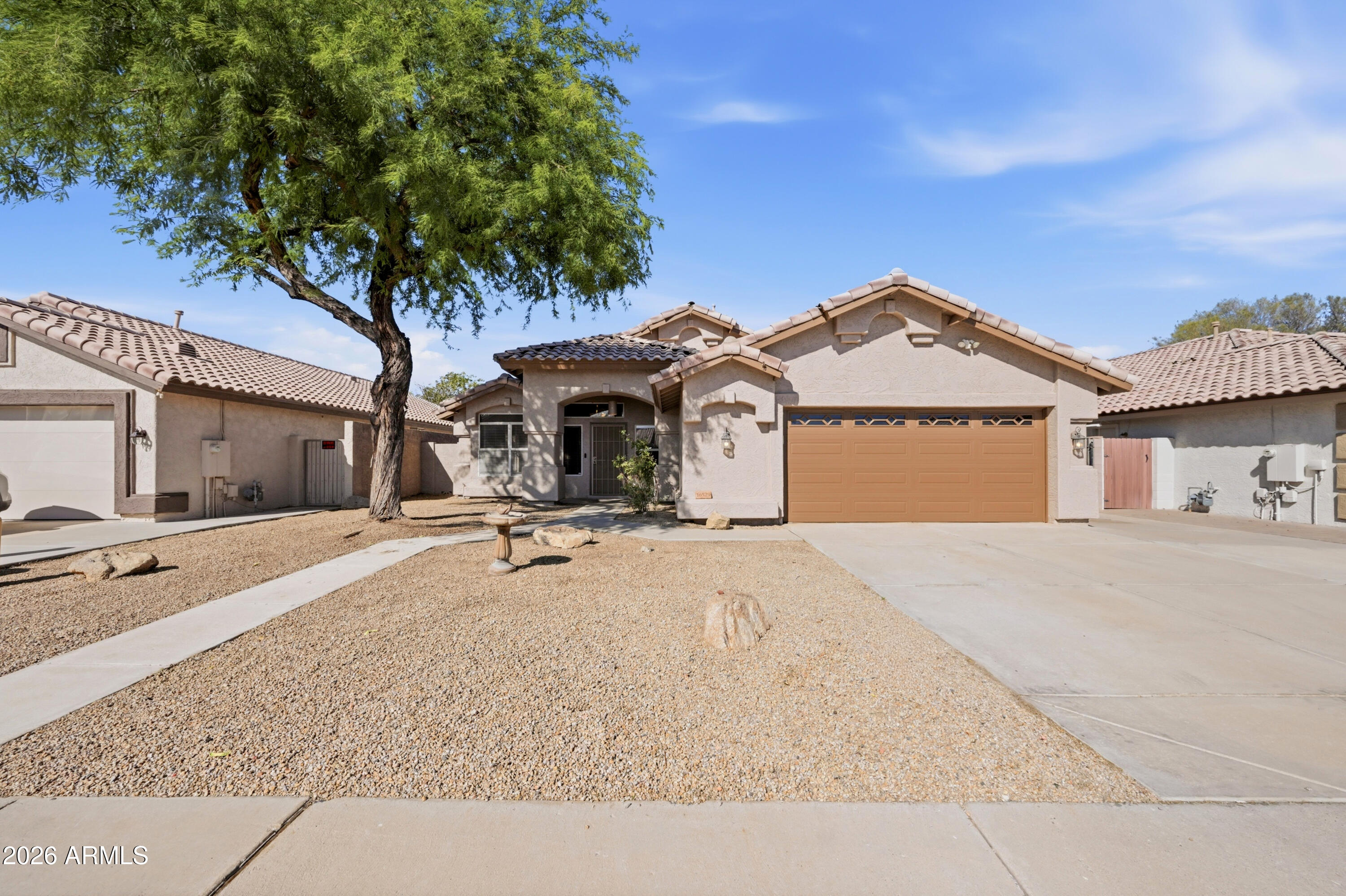 Discover this inviting single-story home at 16529 North 89th Avenue in Peoria's desirable Arrowhead Cove neighborhood. NEW INTERIOR & EXTERIOR PAINT, built in 1995 and offering approximately 1,913 square feet of comfortable living space, this well-maintained residence features 3 bedrooms, 2 bathrooms, a versatile office/den, and a 2-car garage. Inside, you'll love the open and functional floor plan with separate living and family rooms, a formal dining area, and a bright kitchen perfect for everyday meals and entertaining. The spacious primary suite provides a private retreat, while the additional bedrooms offer flexibility for family, guests, or a home office. Outside, enjoy true Arizona living with your own private pool in the backyard--ideal for cooling off and family fun-- plus a covered patio for relaxing or al fresco dining. The lot includes convenient RV gate access for extra storage or parking, and best of all, there is no HOA, giving you complete freedom to personalize. This prime location sits right next to a park and greenbelt with walking paths and open space, while offering easy access to Loop 101, shopping, dining, top schools, and all Peoria has to offer. Priced under $500,000, this move-in-ready gem is a fantastic value for first-time buyers, growing families, or savvy investors--don't miss your chance to make it yours!