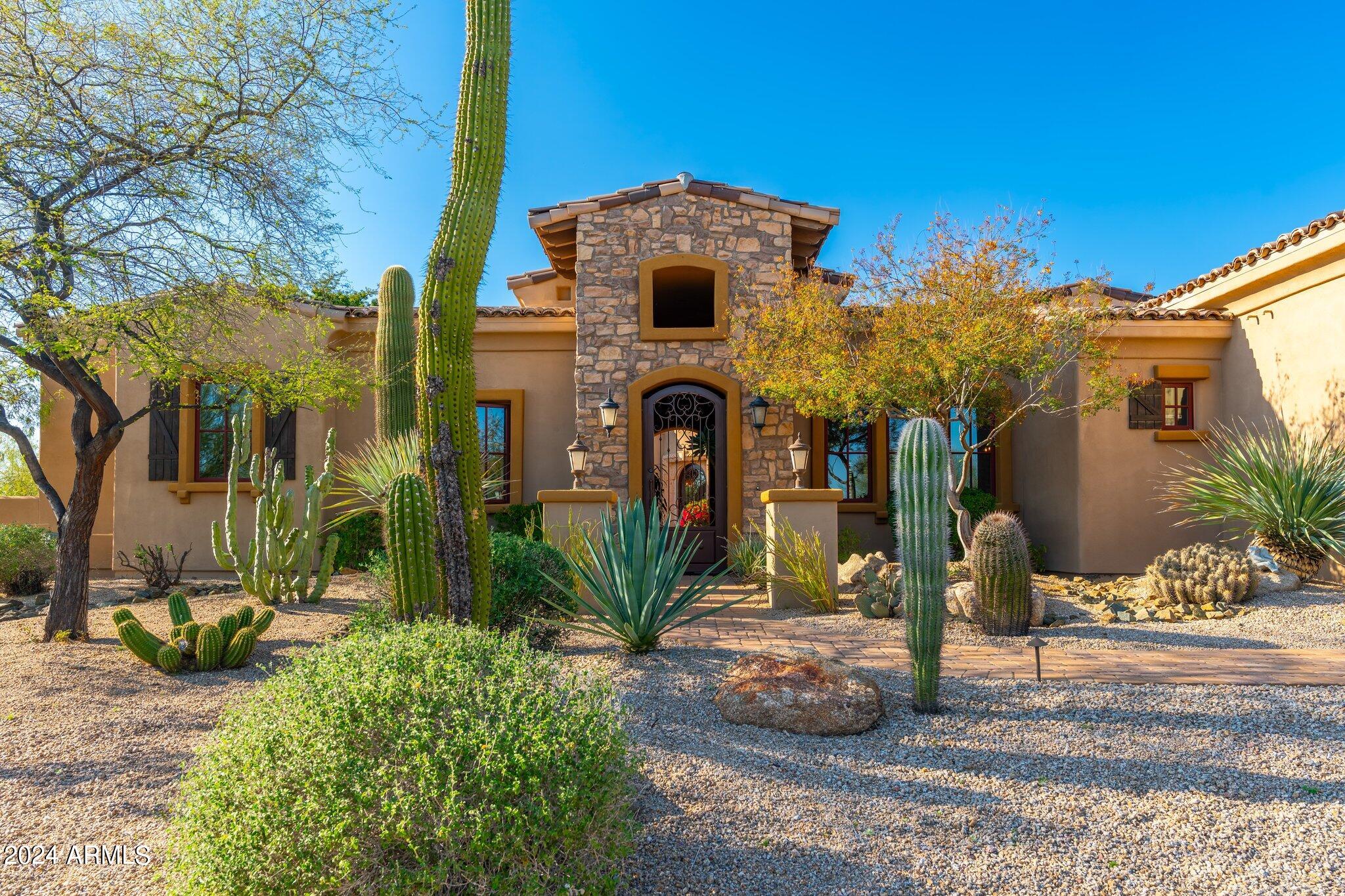 Gorgeous custom home in the desirable North Scottsdale neighborhood of Los Gatos. Sitting on nearly an acre and a half, this 5-bedroom home has it all, boasting unparalleled craftsmanship and attention to detail, offering a seamless blend of elegance and comfort! The gourmet kitchen, equipped with top-of-the-line appliances and an expansive island, overlooks the living room and a cozy breakfast nook, ideal for entertaining. The 1bed/1bath casita also offers a kitchenette and courtyard access, making for a perfect in-law suite or retreat for guests or extended family. Outdoor living includes multiple covered patios, pool and spa, an outdoor kitchen, enclosed courtyard, firepit, and so much more. With proximity to shopping and dining and easy freeway access, this is the perfect location!