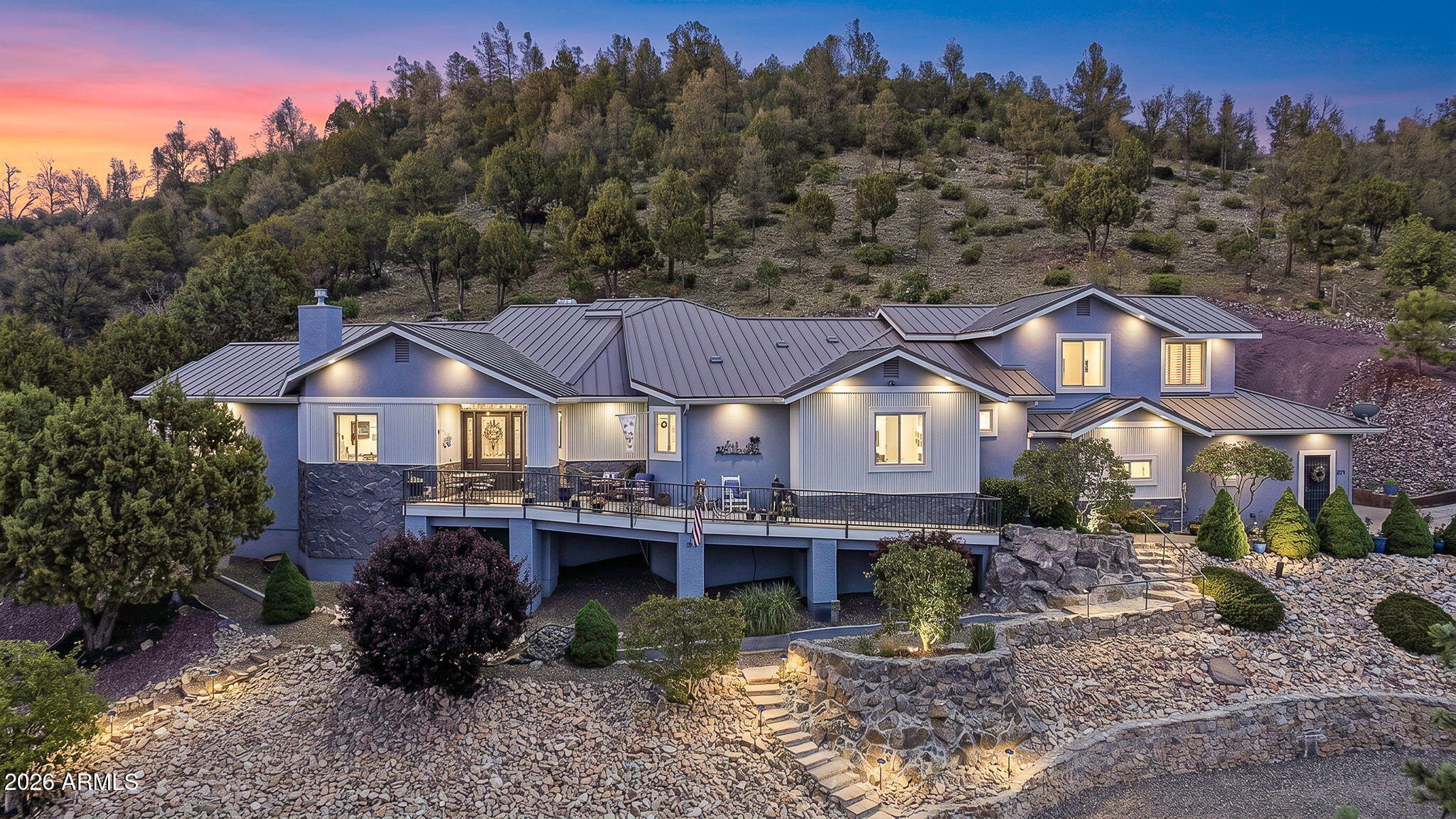 Rare single-level living on over an acre with breathtaking views and zero HOA restrictions. With four bedrooms -- each with its own private bath -- every guest and family member enjoys their own sanctuary under one roof. This home delivers privacy, space, and premium amenities.

Entertain, exercise, and unwind in your private saltwater indoor spool, park everything in the 3+ car garage, and let the dogs roam freely across two dedicated dog runs. A fully enclosed hillside garden area above the second terrace sitting area adds yet another versatile outdoor space, accessible through two gates with views to match.

The durable metal roof does more than protect -- it channels rainwater from multiple downspouts into a 1500-gallon collection tank, feeding the property's irrigation system sustainably. Owned solar, whole-home water filtration, soft water, and a self-programming instant hot water system mean this home runs as good as it looks.

Turnkey, thoughtfully upgraded, and ready for its next chapter. Opportunities like this don't come around often.