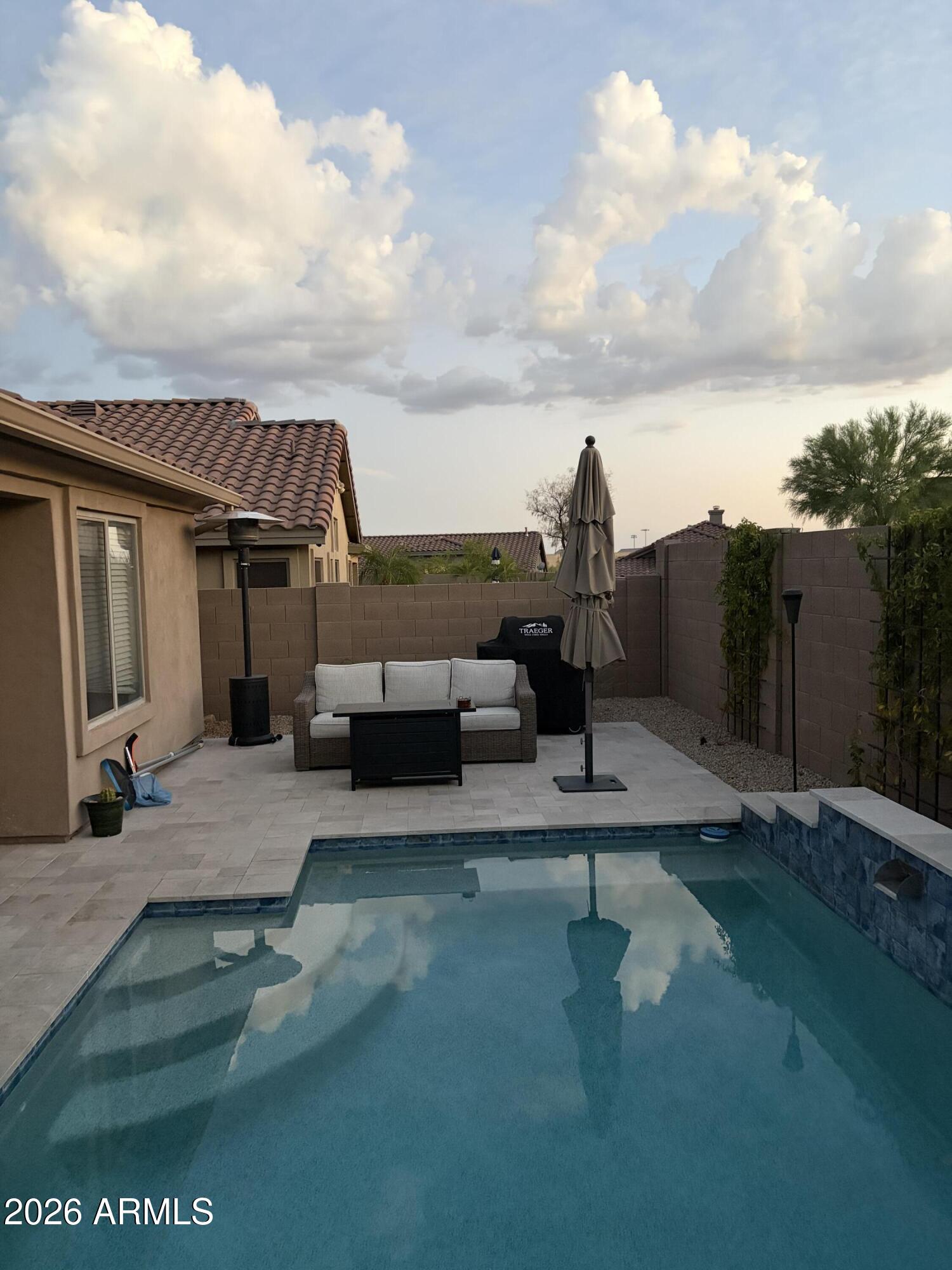 Former designer remodel! In quiet neighborhood w/all a buyer could want! LIGHT & BRIGHT home w/VAULTED ceilings & skylights. Gorgeous PALETTE of GRAY & WHITE finishes. Step inside & enjoy popular/versatile WOOD-LOOK floor tile throughout all main living areas! Chef's kitchen featuring crisp white cabinets. Fantastic QUARTZ countertops & SUBWAY TILED BACKSPLASH & STAINLESS appliances. STUNNING master bath, featuring WALK-IN SHOWER w/three tile finishes that create a relaxing CLASSY feel! LARGE WALK-IN master closet! Double master vanity w/white cabinets & QUARTZ countertop complete this beautiful master bath! The SPARKLING HEATED POOL makes this a HOME RUN! Come check it out!!!
