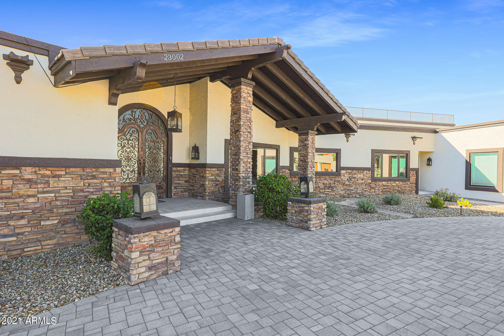 This 6 bedroom 6 bathroom fully remodeled home is a sprawling 8443 square feet. It sits on a 32300 square foot lot in the gorgeous neighborhood of Pinnacle Peak Shadows with views from nearly each window of the home. The home boasts a large gourmet kitchen, guest casita with kitchen and it's own attached garage. The property has enclosed RV parking as well! The finished basement is an added bonus with wine tasting room, movie theater, and kitchenette. The backyard is an entertainer's dream with an outdoor kitchen, pool, sport courts, fruit trees, 2 covered patios and fire pit. Don't miss the expansive unobstructed views from the roof top deck!