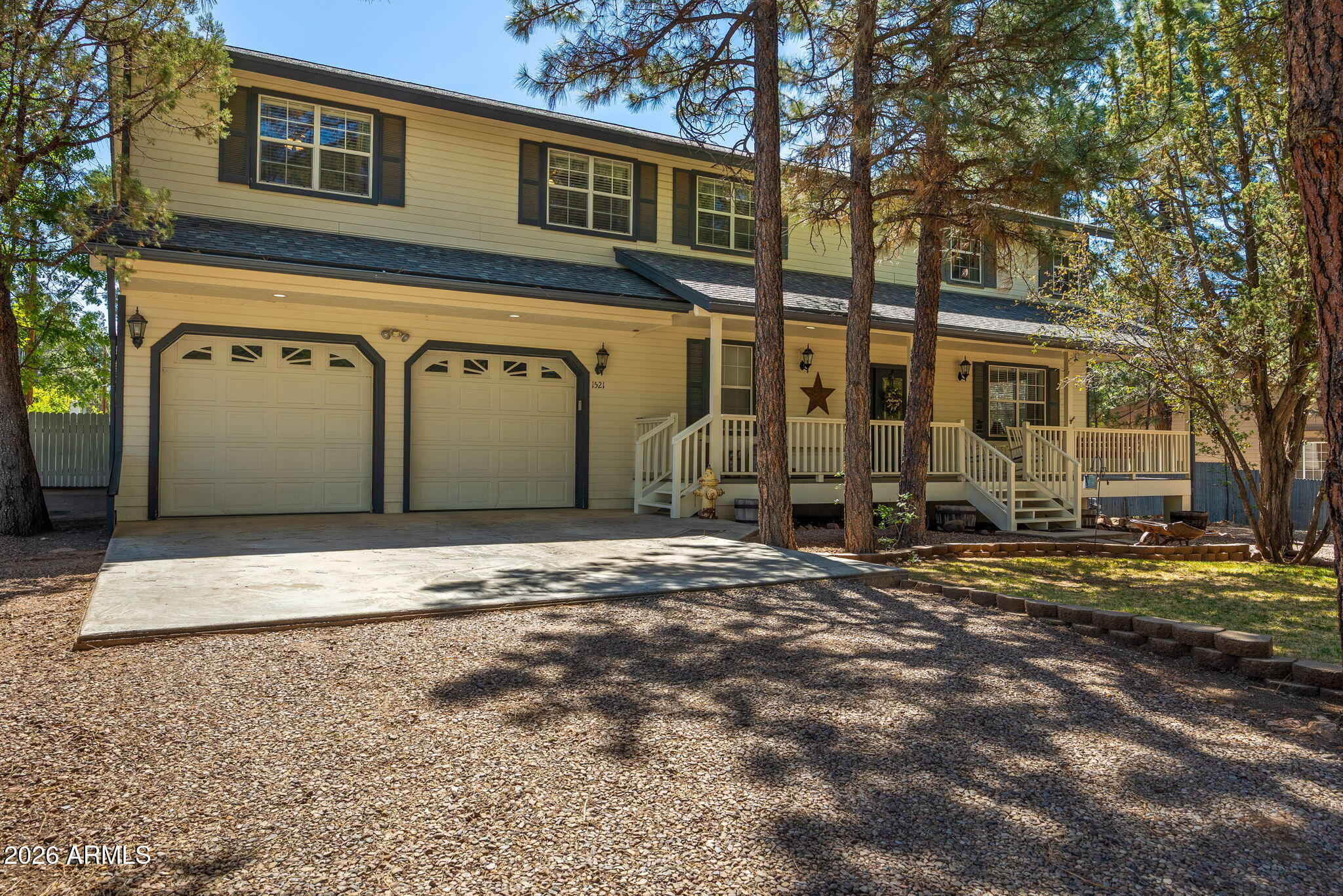 Nestled in the desirable Country Club Manor community, this spacious 4-bedroom + den, 3-bath home offers approximately 2,780 sq ft of comfortable mountain living with no HOA! This well-maintained home features a versatile floorplan with a large loft, oversized 2-car garage, and newer luxury vinyl plank flooring throughout. The inviting living area is highlighted by a cozy gas fireplace, while the kitchen features a gas stove and plenty of space for entertaining.   All of the bathrooms and the kitchen have been beautifully remodeled and have quartz countertops. Step outside to Trex-deck front to sit on the porch swing, or the back porch overlooking the fenced backyard complete with a basketball court and two RV gates for added convenience and storage flexibility. Enjoy year-round comfort with central air conditioning. Sewer service, wood frame construction with durable hardboard composite siding, and a shingle roof add to the home's appeal. This home is ready for you to create many memories.  Conveniently located near golf, shopping, dining, and all that Show Low has to offer.