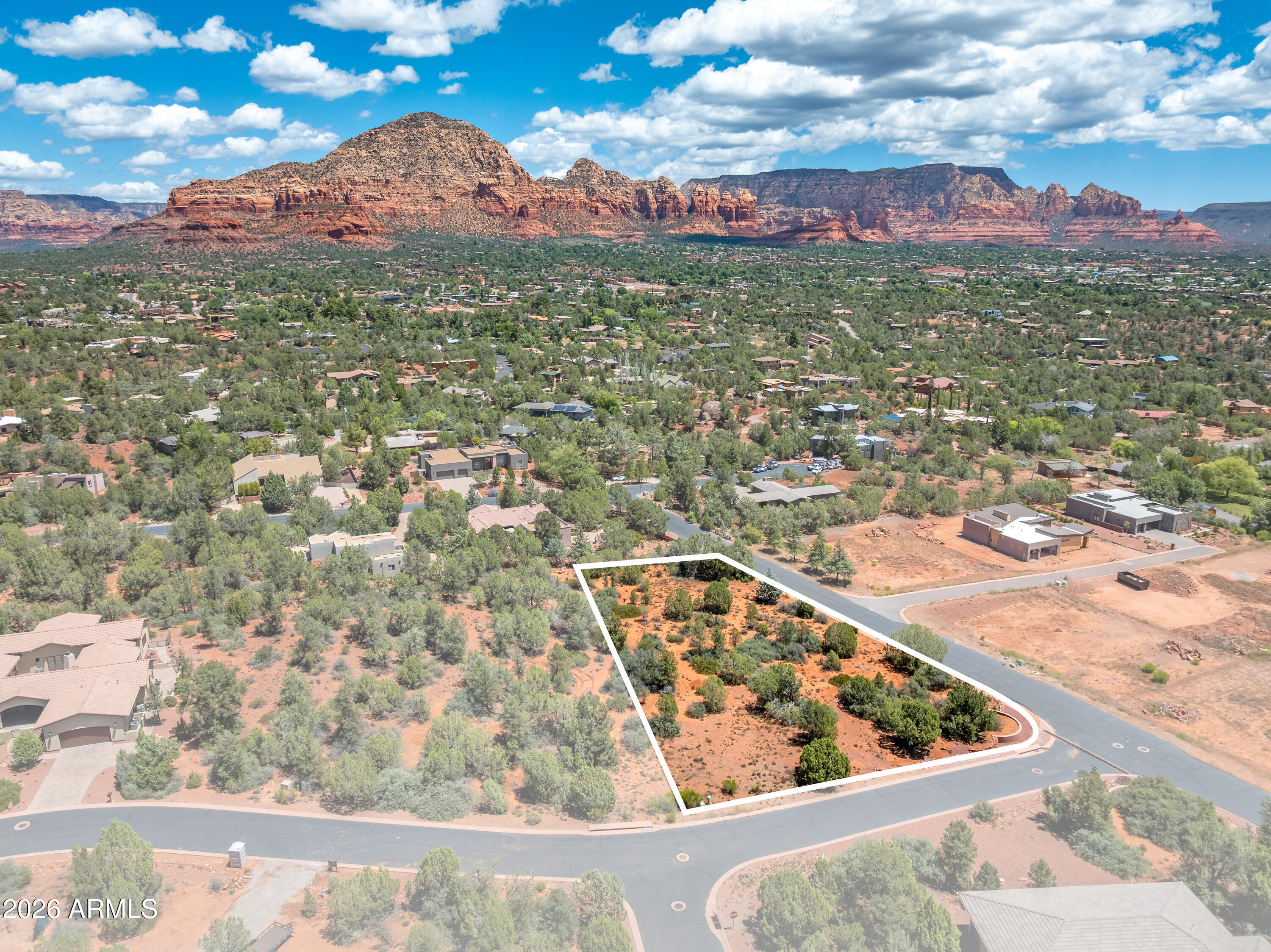 Skip the months of planning -- 3040 Calle del Arroyo comes with a full set of architectural plans for a stunning 3,600 sq ft Desert Modern home designed by Sedona's own Simone Mussa. The hard work is done. Direct views of Thunder Mountain -- the iconic mountain thats visible from the A+ building sites in West Sedona -- set the stage for something truly special here. This lot puts you in a prime West Sedona location with a clear, accelerated path to breaking ground. Plans in hand. Views locked in.