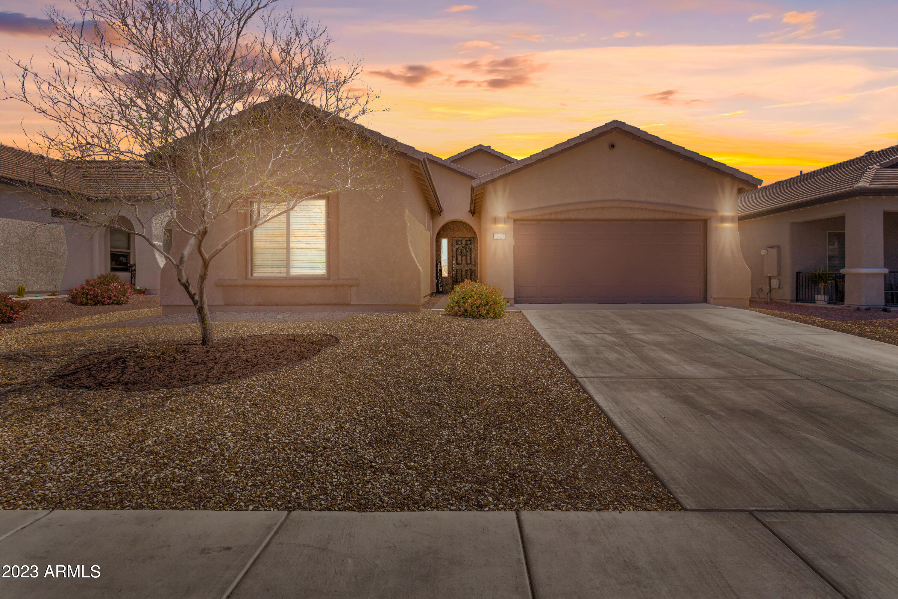 THIS IS THE ONE!! This gorgeous home is ready for you to call it home! It is 3 bedrooms, 1 den/bonus room, 2 bathrooms and perfectly laid out split floorplan. Primary bedroom and on-suite is located on the opposite side of the house.  Den/Bonus room is located off the living room with double doors - perfect for a play room, sitting room, office, library or another guest room. Kitchen is accented with granite counter tops and open concept to dining area and living room. Off of the kitchen is the spacious ''hobby room'' where you will find the laundry hook ups and the door to your 2 car garage. Head out back to a thoughtfully landscaped yard with artificial grass and additional pavers to allow for added entertaining and enjoying space. You have to see this one in person to fall in love.