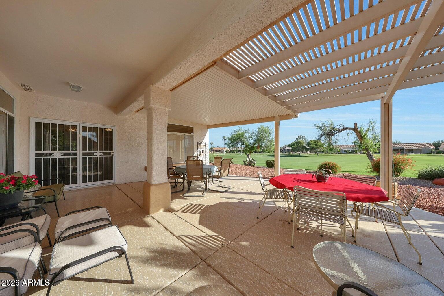 Imagine seeing the golf course as you walk in the front door and just about every room. Seller will CONSIDER CONCESSIONS with a reasonable offer! This inviting residence features a 2 and 1/2-car garage with built-in cabinets, laundry area. Inside, you'll find skylights, custom paint finishes, recessed lighting, & soft carpet in all the right places. Enjoy both formal living & dining rooms for entertaining, along with a cozy family room ideal for everyday relaxation. The eat-in kitchen has SS appliances, ample counters, breakfast bar, pantry, & plenty of cabinetry. Serene backyard boasts a covered patio, extended ramada, & breathtaking views of the golf course and mountains. This is the one you have been dreaming about, dont wait and let it slip away. more... The main bedroom provides private backyard access, walk-in closet, & a bathroom w/dual sinks. Mature Grapefruit Tree within small fenced side yard.