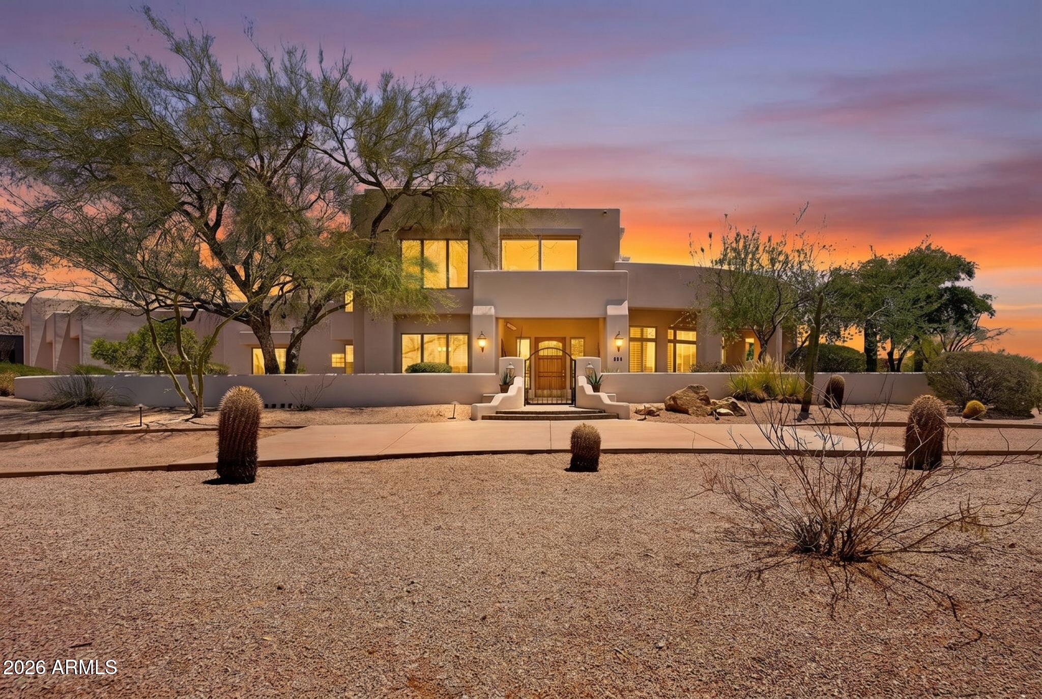 Back on market, Buyer could not perform! 
Priced below comps, great opportunity to own a custom home in NE Mesa.  Two story home with 3 bedrooms, 3 baths, large loft with walk out  deck affording views of the mountains and citylights. Home sits on over an acre of land and offers a 6+car RV garage  and RV gate with plenty of storage. 
Home features large great room finished fireplace, wet bar and expansive set of windows overlooking the front and side yards.  Dining room is complete with an abundance of built in cabinetry, large eat in area and leads to the kitchen. 
Kitchen has double island, pantry, plenty of storage and with an eat in area overlooking the backyard . 
Owners suite features jetted tub, shower, large vanity area, separate commode, storage cabinetry and large walk in clo Office is located on lower level with views of the backyard.
Lower level bedrooms are nice sized with closet space and shared hall bath. Large laundry room is complete with plenty of cabinetry and storage space, built in sink, and looks out onto the backyard. 
Loft area is spacious and finished with wet bar, expansive views of the valley and full bath with cabinety.  
Home is finished with hardwood flooring, tile and carpeting in some rooms. Plantation shutters on front facing windows. 
View deck off of loft area provides a beautiful place to enjoy sunset views with amazing panoramic views of the valley. 
This home is being sold as is.. bathrooms, kitchen, windows, two 
AC units are original.   Stove and two beverage refrigerators are not operable.  

Minutes from hiking, cycling, Usury Park. Saguaro Lake and the Salt River are minutes away. Easy access to Rt. 202 and 25 minutes from Sky Harbor Int'l and Old Town Scottsdale.. great location in an amazing community! 
Priced way below comps ~