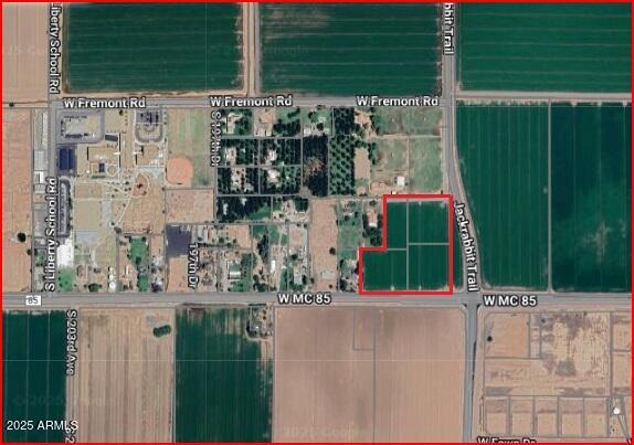 7.25 Acres at the corner of Jackrabbit and MC85! A total of 4 parcels currently zoned R43, residential but perfect for many other uses as well. Irrigated with grandfathered water rights and currently growing a gorgeous crop of alfalfa.  Don't pass up this rare occasion to own at this intersection which is a straight shot north to Interstate 10 which provides direct access to Downtown Phoenix, Loop 101, Loop 202 & Loop 303 freeways. Mc85 provides access to Interstate 8. Located in an unincorporated part of Buckeye this property offers greater flexibility and freedom for development opportunities..
