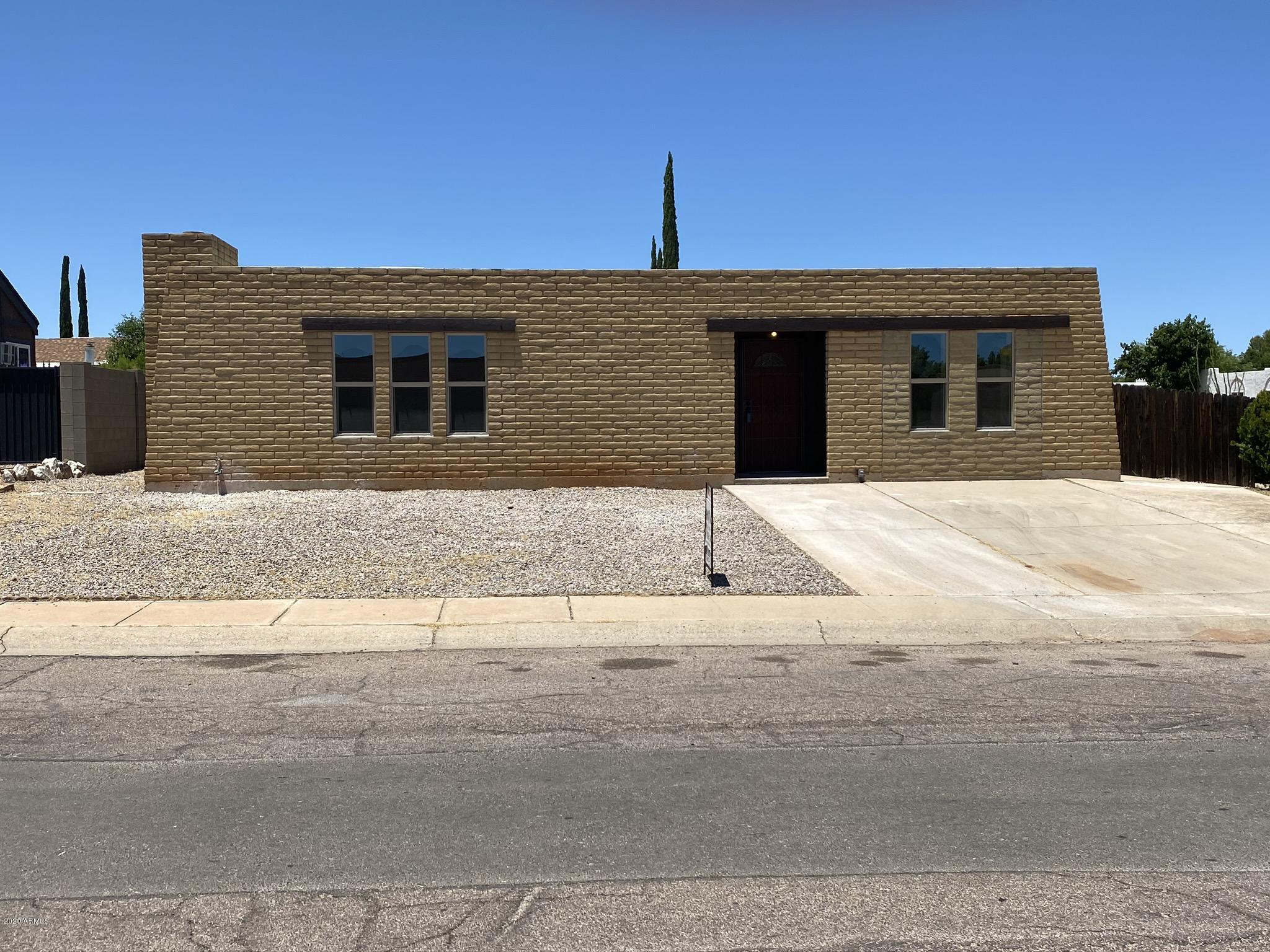 What a cutie !!!4 Bedroom 2 bath Fireplace... 1500 sq.ft. home ,On large Fenced corner lot New Windows,.Newly painted,New flooring,Upgraded Appliances.New light fixtures/Fans.Roof is a Torch down ..Bet This is the one!!!!!