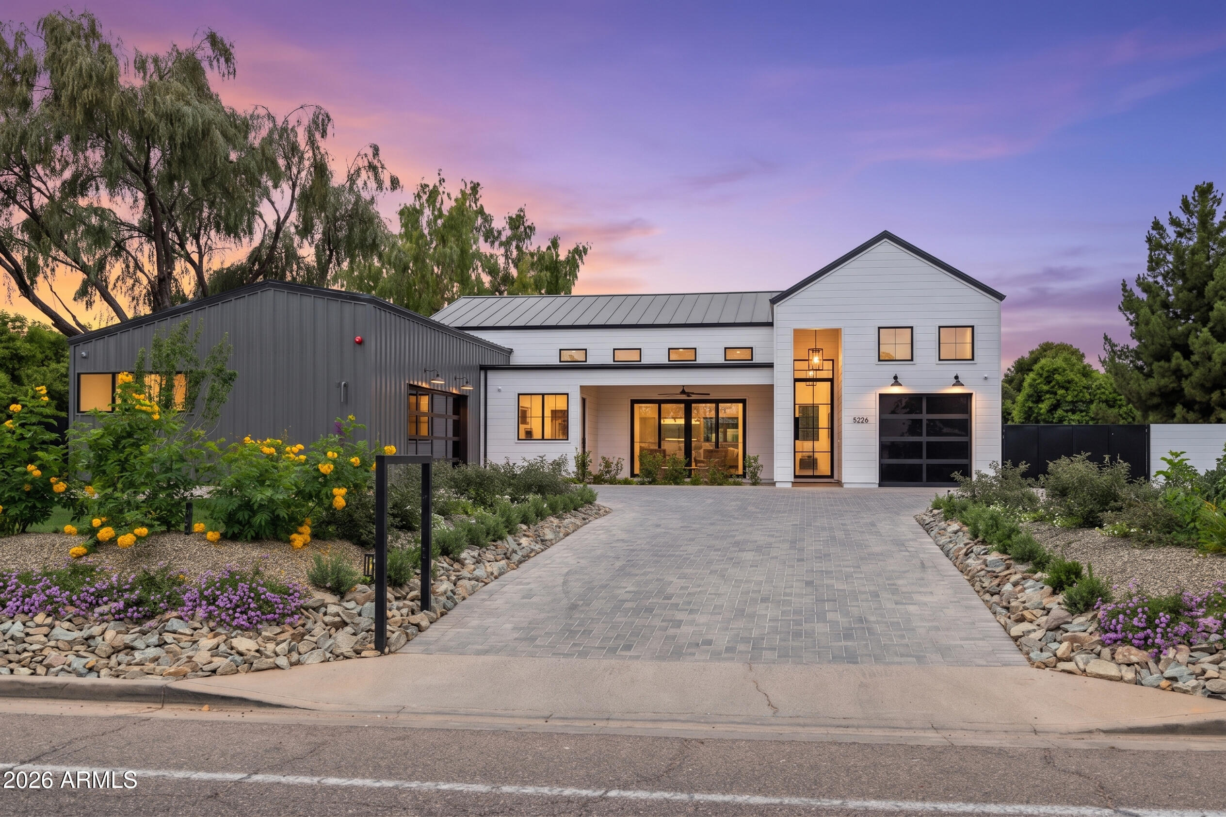 MODERN DESERT MASTERPIECE! Introducing the latest Modern Farmhouse from MAK Homes on nearly 1 Acre in 85254. A welcoming front porch & prominent entry leads to a precisely designed, all-on one-level floor plan with the Kitchen/Great room with clerestory windows & a massive fireplace as its centerpiece. Hardwood floors, and the highest quality windows/doors throughout. The resort-style backyard features a custom Pool/Spa, Ramada, HUGE grassy area, & a stunning Casita, complete with Living, Kitchenette, en suite Bed, & dedicated Pool Bath. Rear yard gate for easy access for future add-ons, flood irrigation + sprinklers. 2 A/C Garages: generous 2-Car and a 1-Car with 15' ceiling for lifts. Horse privileges and plenty of room for stables or an additional garage. Warmth, Sophistication, and Sustainability. Built with a modern interpretation of farmhouse living, the design echoes barn conversion strategies, expansive yet practical spaces, seamless indoor/outdoor flow, and timeless character. The office is ideal for a home business, while the pool house offers independence for guests or multi-generational living. The Metal Roof and Composite Siding means the exterior of this property will last a lifetime. Interior blown-in insulation on the ceilings and inside the walls will mean quieter living, lower energy costs, and a more consist interior temperature.  A Car lover or Equestrian enthusiast? This property enjoys full Horse privileges, let MAK Homes design and build the ultimate Barn and Corral, or a show stopping detached Garage, with room to spare. Steps from Sonrisa Park and just minutes from the redeveloping PV Mall. This is the one you've been waiting for!