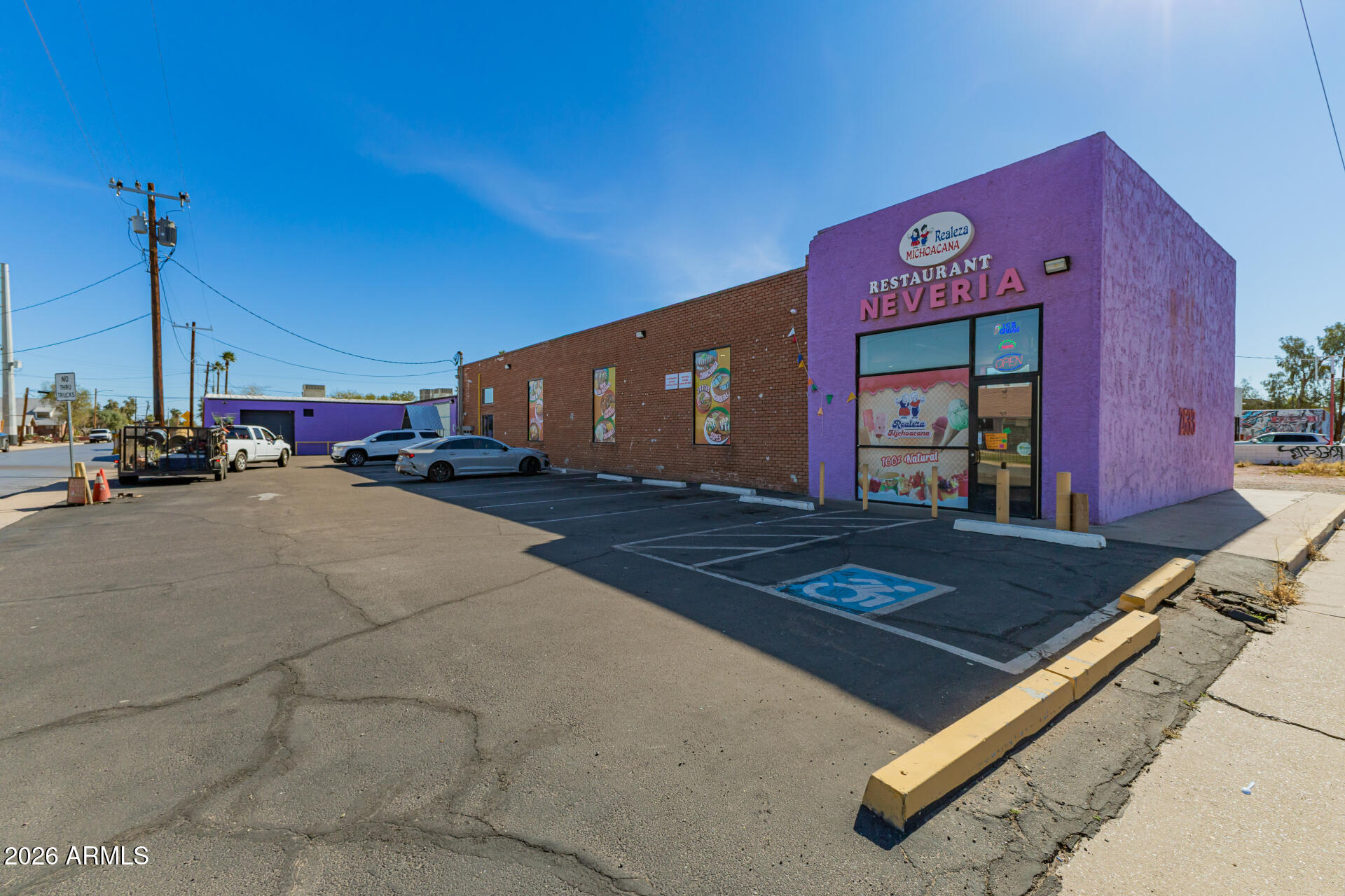 Incredible investment opportunity! Nestled on a premium corner lot, this versatile commercial building enjoys excellent visibility w/tons of parking space, making it perfect for your next business venture! Currently used as a restaurant & event center, the spacious interior makes it ideal for just about anything, whether it's retail, entertainment, or even simple storage. PLUS! The adjacent vacant lot is being sold together, so you'll have plenty of space for expanding if needed! What are you waiting for? Don't let this amazing opportunity slip by!