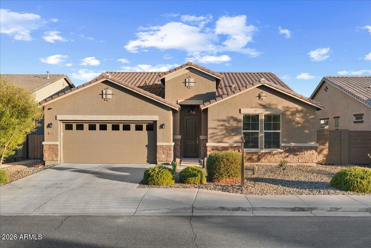 Welcome to this exceptional 4-bedroom, 3-bath home featuring a highly sought-after split floor plan and a private lot with no neighbors behind. The spacious 3-car tandem garage provides ample room for vehicles, storage, and hobbies. Inside, you'll find beautiful wood-look ceramic tile and a chef-inspired gourmet kitchen complete with slab granite countertops, a large center island, gas cooktop, wall oven, built-in microwave, and 42-inch cabinets. The luxurious primary suite offers a spa-like retreat with an oversized walk-in shower and generous walk-in closet. Step outside to your resort-style backyard showcasing travertine pavers, a gas-heated pool with Baja shelf, a Ramada with gas fire pit, and low-maintenance turf. Conveniently located near A-rated schools, this home truly has it all. Vivint Home Security System-Owned- 3 Camera system (Monitoring cost only-$65 a month)
Water Softener System with Reverse Osmosis
Water Filtration System
6ft Deep Gas Heated Pool, with Baja Shelf and umbrella sleeve, in-floor cleaning system, fountain water feature and bench seat surround by Travertine title.
Resort style backyard with covered patio, ceiling fan w/remote, large tv mount and outdoor lighting
Pergola with rain gutters, power outlet and outdoor lighting.
Gas Fireplace
3 car tandem garage with overhead storage racks
Title flooring with wood plank look
3 individual thermostats throughout the house to adjust comfort as needed
Gourmet kitchen with granite countertops, large island with pendant lighting, and an abundance cabinet storage
Walk-in Pantry
Large master bedroom
Master Bathroom has walk-in spa like shower with rainfall shower-head
Walk-in closet and ceiling fan in each bedroom
Brand new water heater
Keyless entry to Front Door, Garage Door and Garage
Dog door within master bathroom linen closet that leads to gated turf side yard
Exterior Sun Screens on the west side of the house