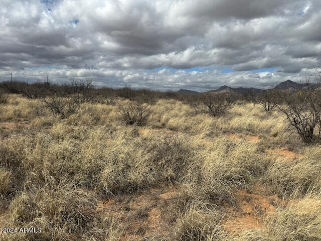 Build or sit your dream home on this Nearly 5 Acre parcel with  Panoramic Mountain Views ,2 well share, Electric close by. No H.O.A.