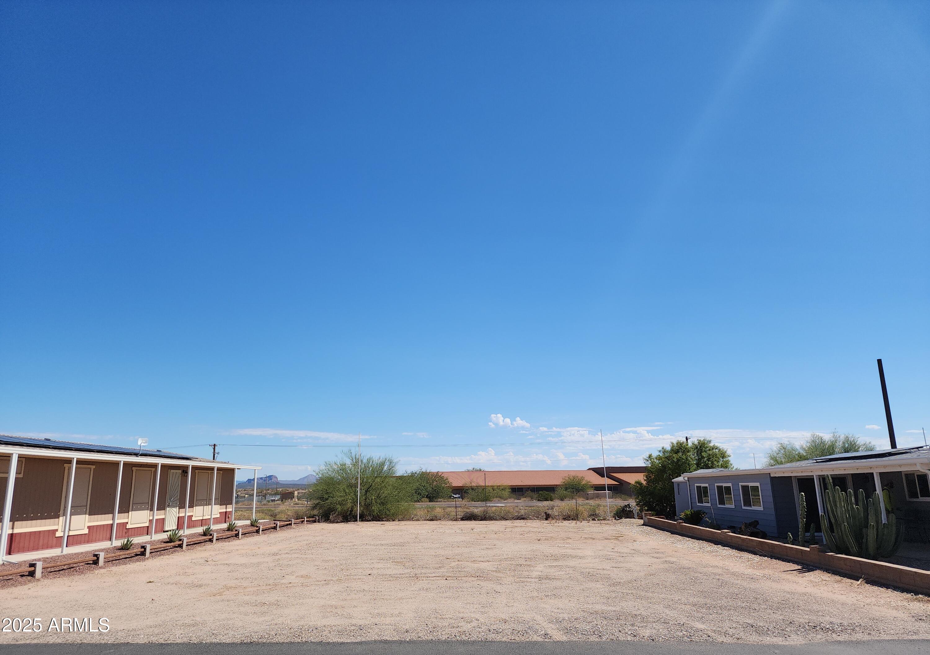 Enjoy the views of the mountain range to the northeast including the Sleeping Lion. A great 60' X 100' lot for a total of 6,000 sq feet with an east west exposure or put the home in facing North & South. Make sure to order lots of windows to enjoy the great mountain views. Florence Gardens is a 55+ community, where you own the land, so there is no lot rent, and is one of five 55+ communities all together here. Florence Gardens has a 9-hole executive golf course with many challenging greens. The club house has a billiards room, auditorium for meals and special performances, a lap pool, a fun pool, and two saunas, an annex with a library and card room, a fitness room, and space for about every other social club you can think of. The lot is level, cleared and ready for your new home.