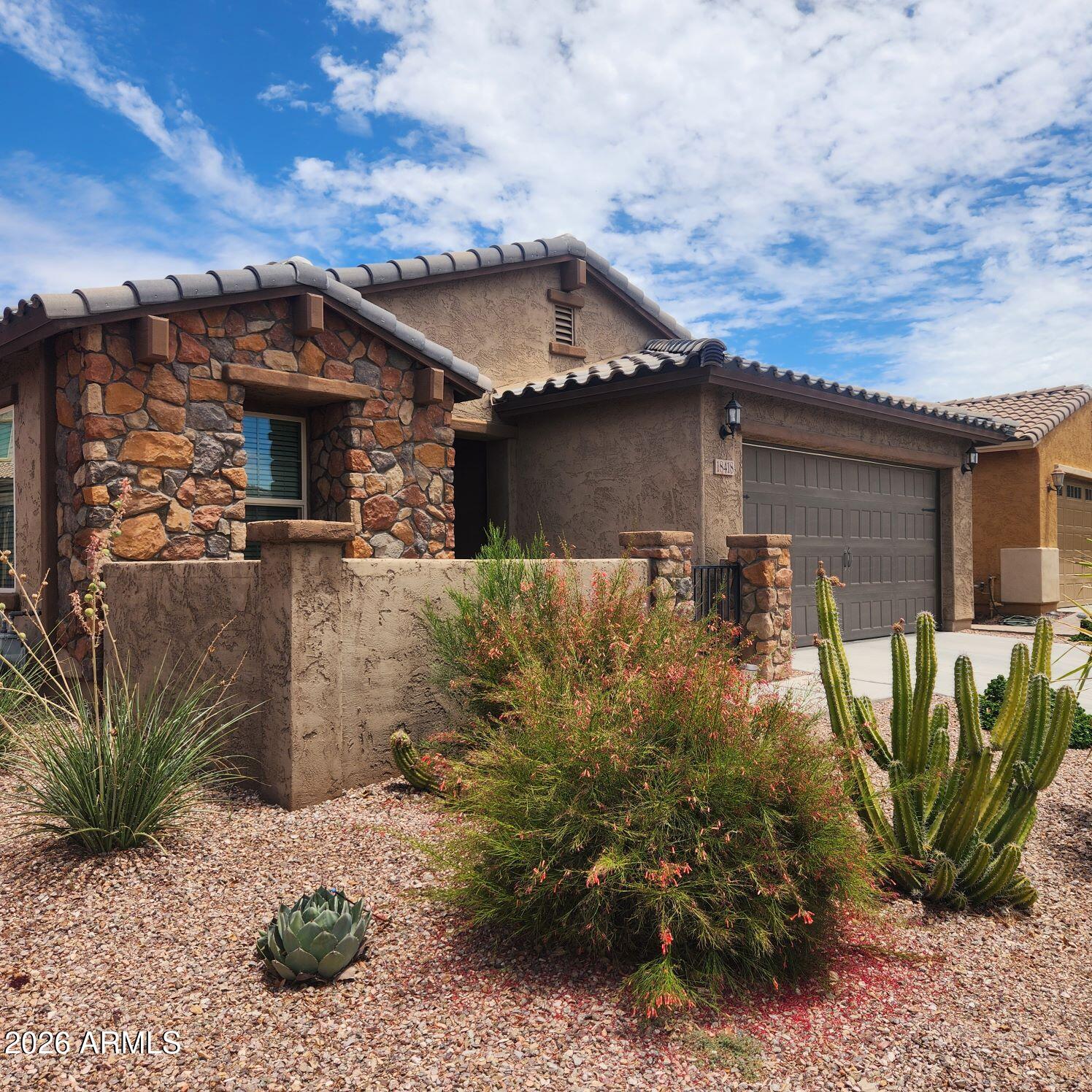 NOW ACTIVE ON MARKET AND LEASE PRICE REDUCED!! BEST PRICE AND THE NICEST HOME IN LAS BRISAS. TENANT MOVING OUT AT THE END OF THE MONTH. This home is a knockout and not like most rentals you have seen.  Warm and inviting home in perfect shape.  3 bedrooms ''plus'' a den with a closet (can be used as a 4th bedroom).  Stone veneer front elevation with a courtyard.  Pro-Landscape front and back (low maintenance). Upgraded kitchen with staggered cabinets, yards of granite counters and all stainless appliances.  Even comes with a washer and dryer. Laundry sink in the garage.  No carpet-all tile and laminate wood.  If you are tired of seeing run down rental homes, you are in for a treat.  Owner / Agent / Manager.
No admin. fees!!!