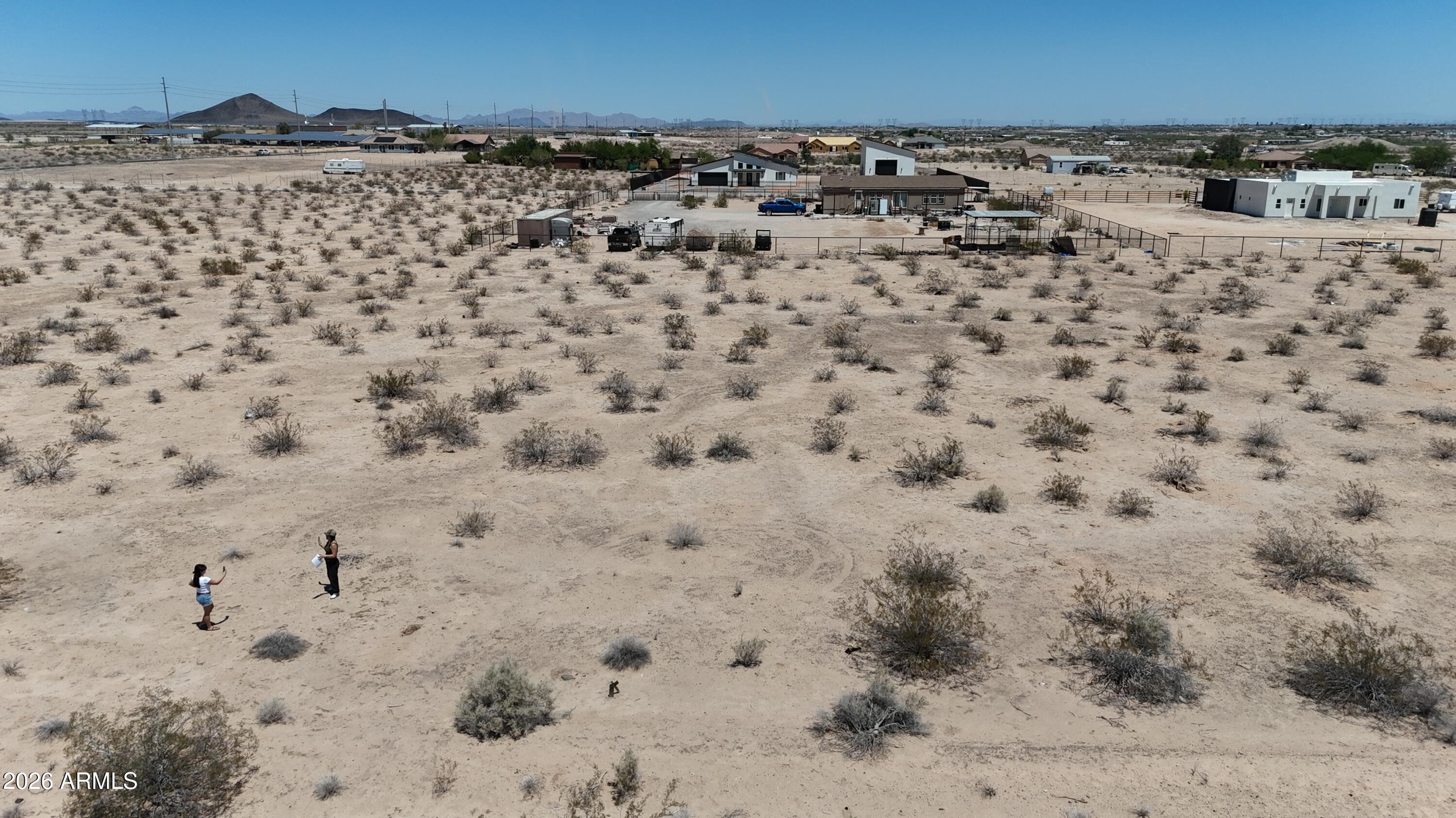 1 acre to build your dreams...far enough for peace & quiet, close enough to the paved road. Water may be available! Inquire with Global Water.