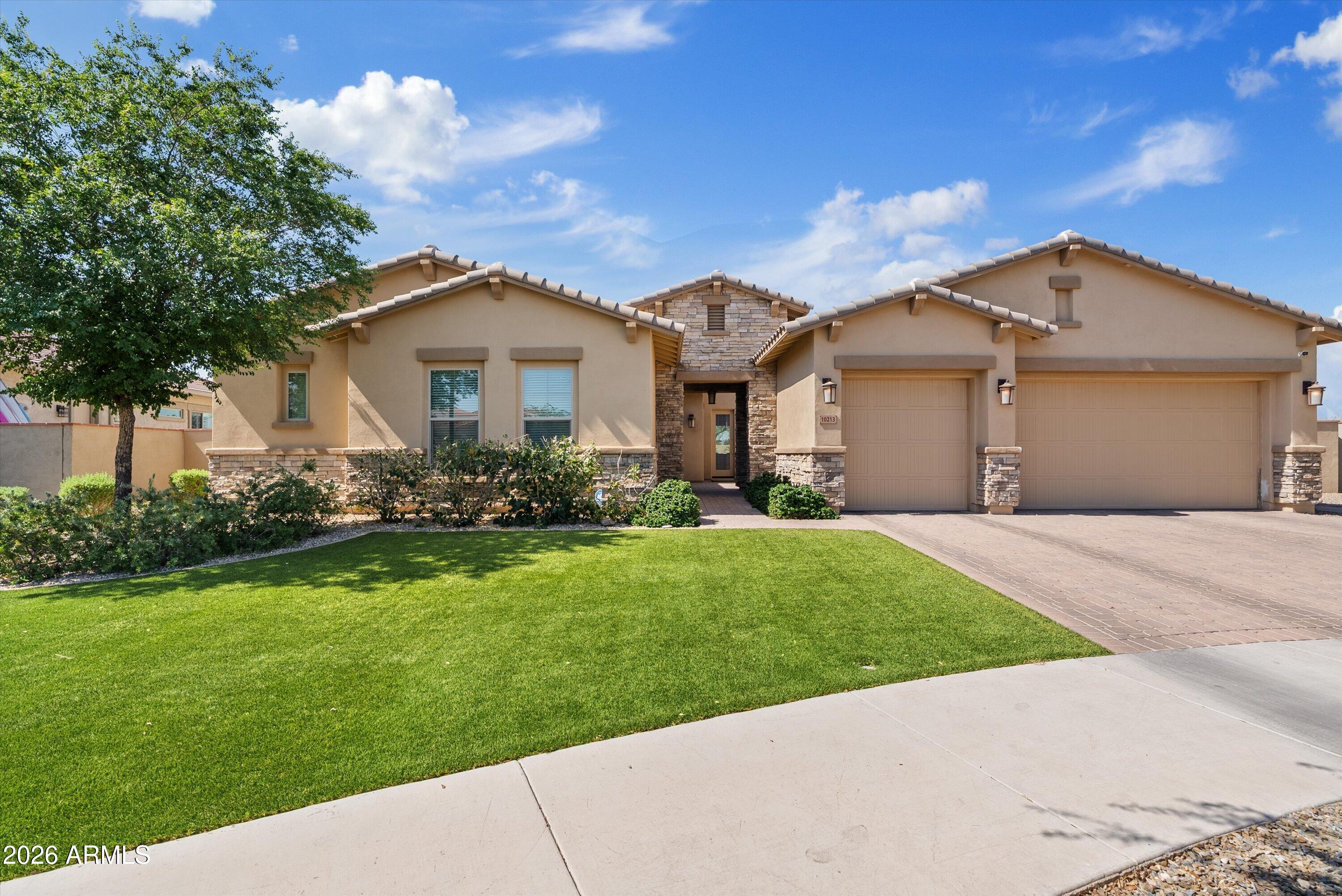If you've been searching for the sense of community that Eastmark is known for, but desire more space, privacy, and luxury, this is the opportunity you've been waiting for.

Situated on a rare cul-de-sac lot just shy of half an acre, this exceptional David Weekley residence is located within one of Mesa's most sought-after gated communities, where all homes are single story and thoughtfully designed on larger homesites with wider streets and a more refined atmosphere. With no rear neighbors and an expansive four-car garage, this property offers a level of privacy and exclusivity rarely found in today's market.

Inside, the gourmet kitchen anchors the home with high-end finishes, generous gathering spaces, and seamless indoor-outdoor flow designed for both everyday living and effortless entertaining. 

The backyard is nothing short of extraordinary. A sprawling resort-style pool with Baja shelf is framed by an expansive travertine deck, creating the ultimate setting for Arizona living. Host unforgettable gatherings around the built-in BBQ and pergola, enjoy friendly competition on the half-court basketball court, or simply relax and take in the peace and privacy of your oversized homesite.

Offering the community connection and lifestyle buyers love about Eastmark, paired with larger lots, greater privacy, gated security, and luxury single-level living, this home represents a rare opportunity to experience Mesa living at its finest.
