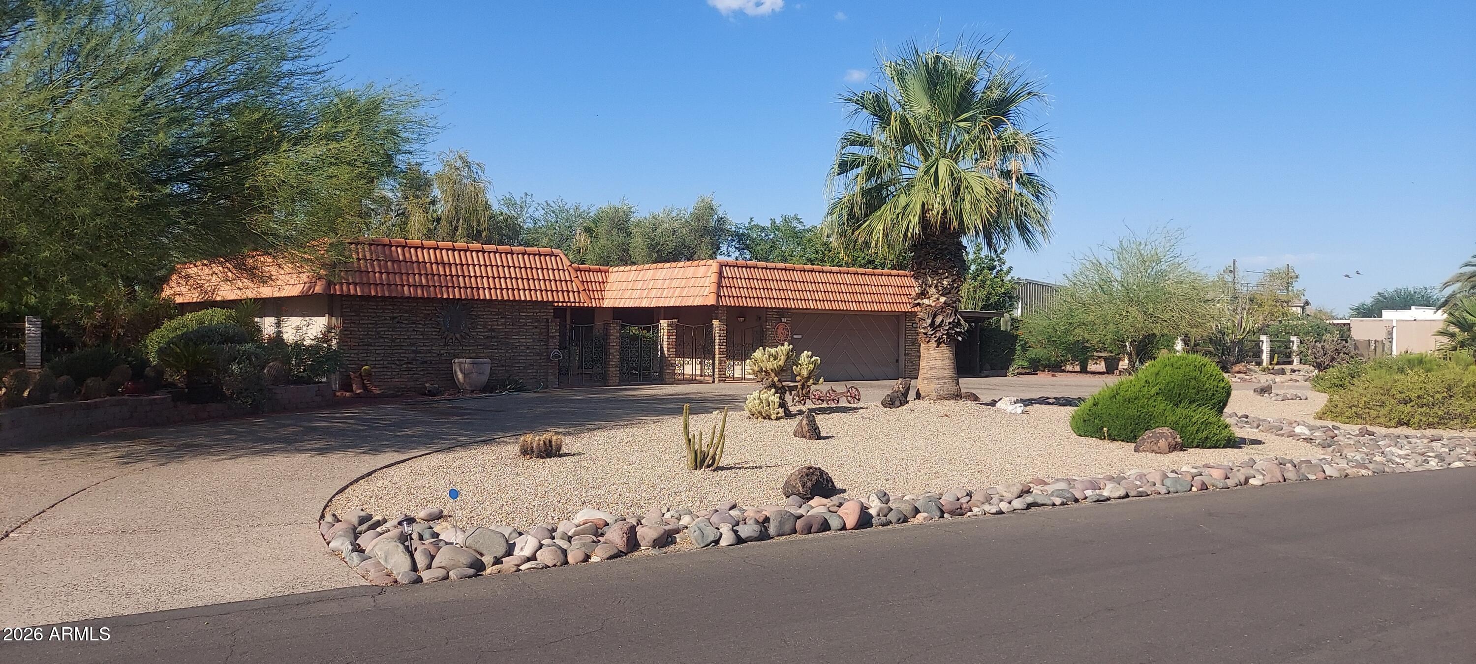 Opportunity is knocking in Sun City! This 2-bedroom, 2-bathroom home sits on a rare 1.23-acre corner lot in one of the Valley's most sought-after 55+ communities -- and with 2,750 sq ft of living space, the bones are there for the right buyer to make it shine. Bring your vision and a little elbow grease and build some serious sweat equity. Solar is already in place to help keep those utility bills in check. Priced to reflect condition -- opportunities like this, with this much space and land in Sun City, don't come around often. Come see the potential!