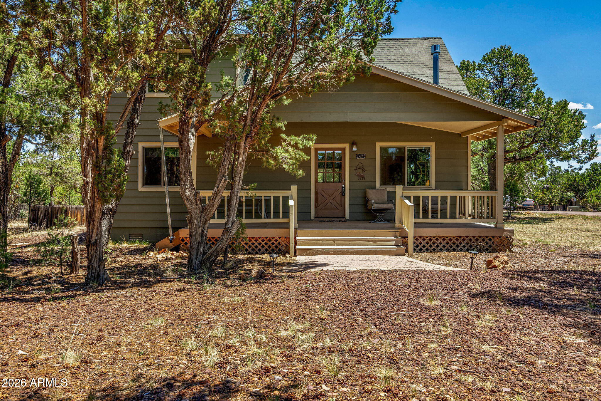 After many happy years, the owners are ready to pass this well-loved cabin on to its next chapter. Move-in ready and thoughtfully maintained, the home features an open floor plan anchored by a spacious living room with vaulted ceilings and a gas fireplace, an inviting spot to unwind or gather with friends. 

A split-bedroom layout adds privacy for family and guests, and the roomy primary suite includes its own ensuite bath. 

Upstairs, a flexible loft works equally well as extra sleeping space, a home office, or a game room. The dedicated laundry room opens to a partially fenced yard with a storage shed, making everyday living easy. Whether you're after a weekend retreat or a year-round home, this cabin is ready for its next owner.