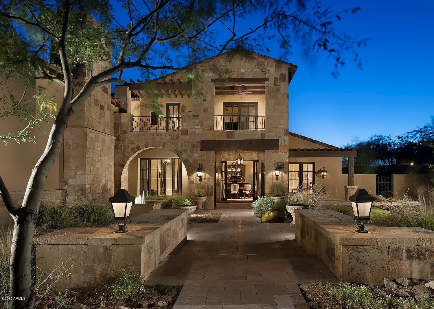 Located in the highly sought after Horseshoe Canyon in Silverleaf, this 6,030 square foot home features 5 bedrooms (including large 2 bedroom guest casita with full working kitchen), 5.5 Bathrooms, city and mountain views, on a 1.03 acre site. Private outdoor spaces, a large backyard with southern exposure, built-in patio heaters, fireplace, 2 poolside fire pots and large fire pit all make for the perfect venue to entertain. The home design includes an open kitchen and great room, large master suite, beautifully appointed office, custom wine room, exercise room, 4 interior fireplaces as well as the best in home automation, including auto shades, security, lighting, etc.   The best of Silverleaf and just a short distance to the renowned Silverleaf Club and Spa.