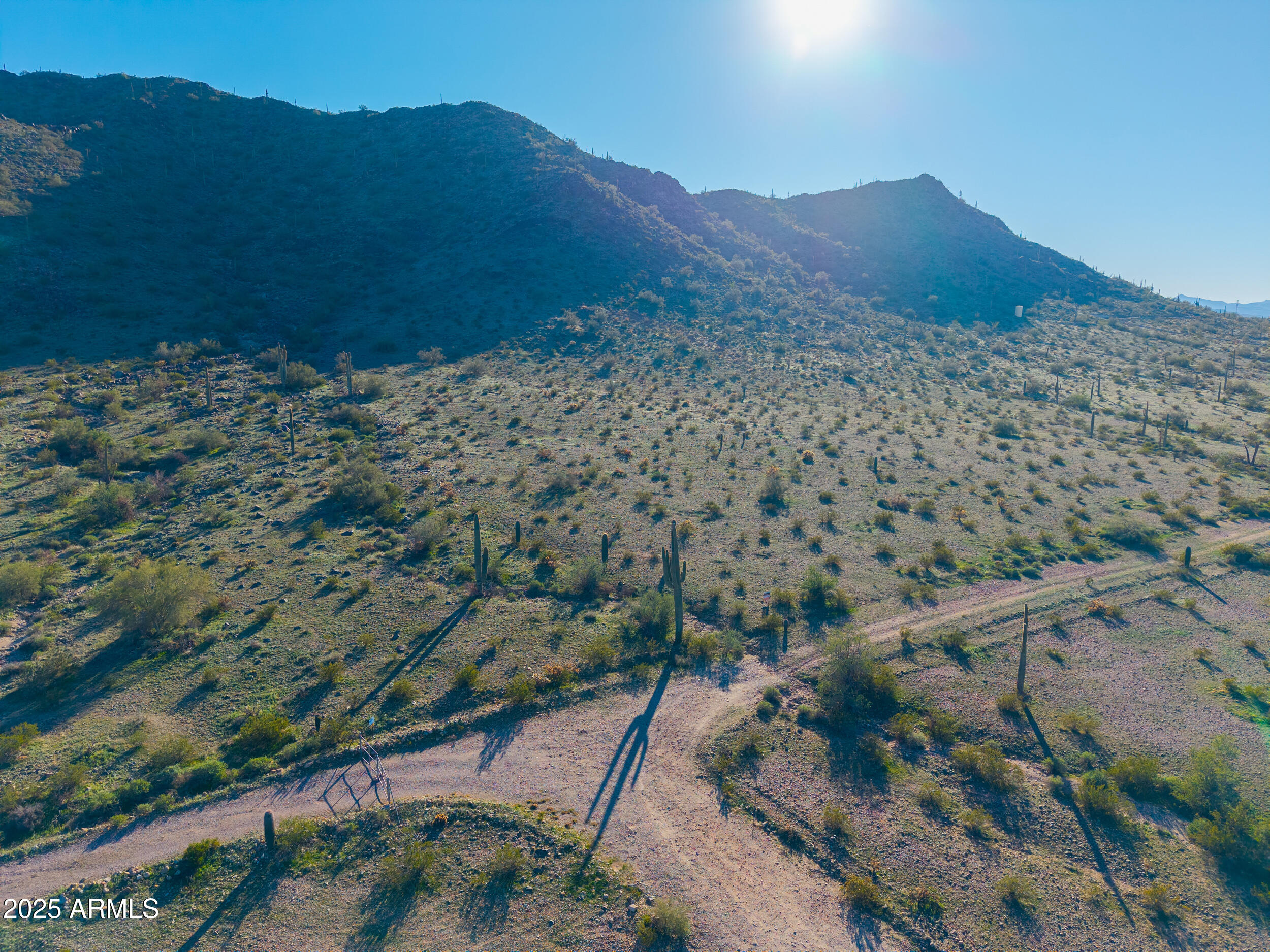 Multiple MOUNTAIN views in every direction on this 9.62 acre parcel with saguaros, other cacti, ample vegetation and privacy. Borders public lands. No HOA.
ED#3 is electric company.