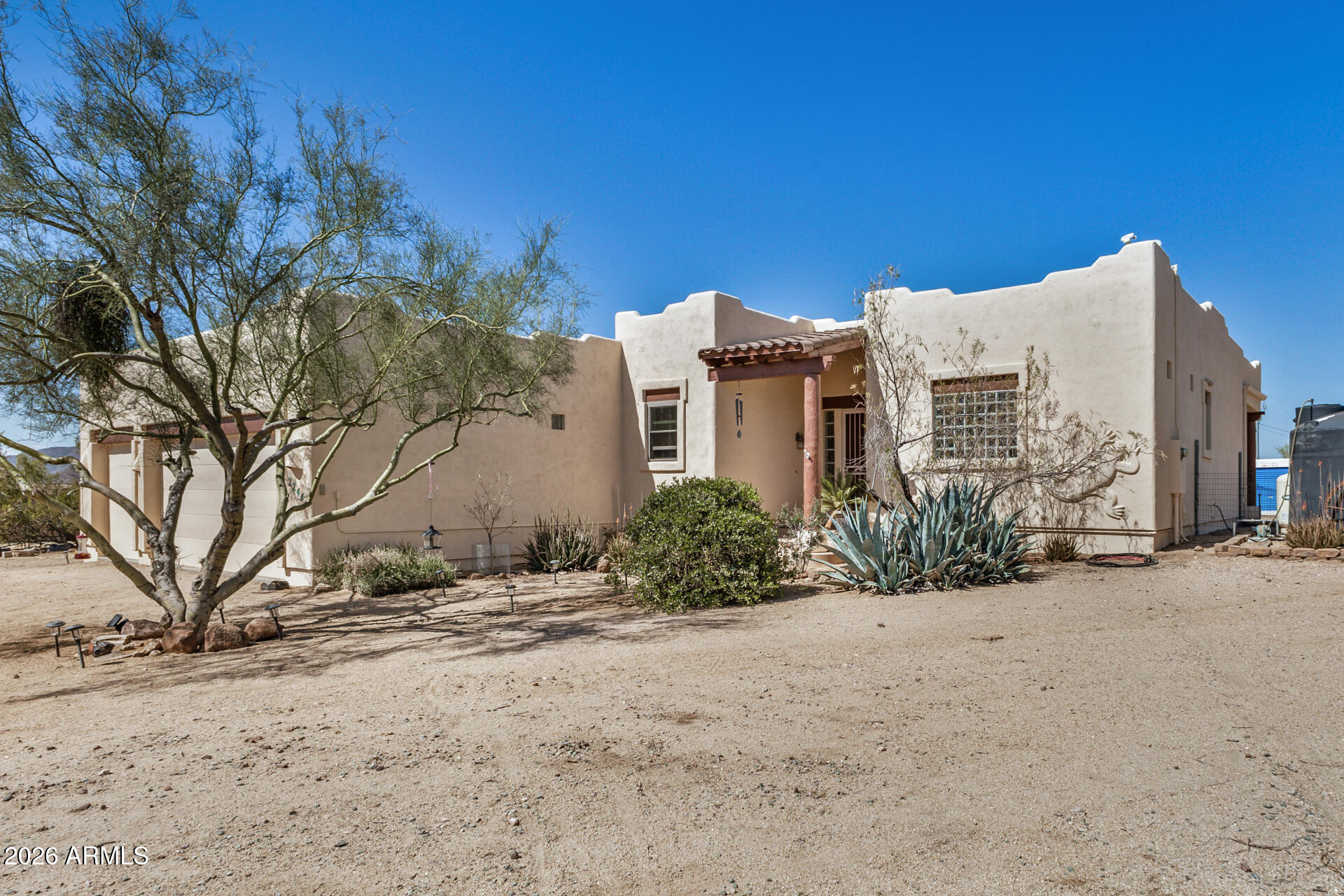 *Seller is offering $10,000 in seller concessions toward a rate buy-down or closing costs as well as a 1 year home warranty with an approved offer!*

If you've been looking for space, privacy, and true Arizona desert views, this 3-bedroom, 2-bath home in New River delivers. Situated on 1.46 acres with no HOA, you'll have room to spread out -- and the freedom to use it your way.

Horse privileges make this property especially versatile, complete with a fenced horse pen and shade structure already in place. The large fenced backyard offers additional flexibility for pets, projects, or simply enjoying the outdoors. The home has been freshly painted inside and out, and the air ducts and dryer vents have been recently cleaned, adding to its move-in-ready appeal. The split floor-plan creates separation between the secondary bedrooms and the primary suite. The primary bedroom includes a walk-in closet, while the en-suite bath features dual vanities and a jetted tub -- perfect for unwinding at the end of the day.

A 3-car garage provides generous storage, and the covered patio is an ideal place to take in the sweeping desert landscape and big-sky sunsets. The expansive desert setting creates a peaceful backdrop for enjoying Arizona's natural beauty, where sightings of deer, rabbits, owls, and other native wildlife -- including the occasional bobcat -- are part of the charm of New River living.  This is the kind of property that gives you breathing room -- both inside and out.