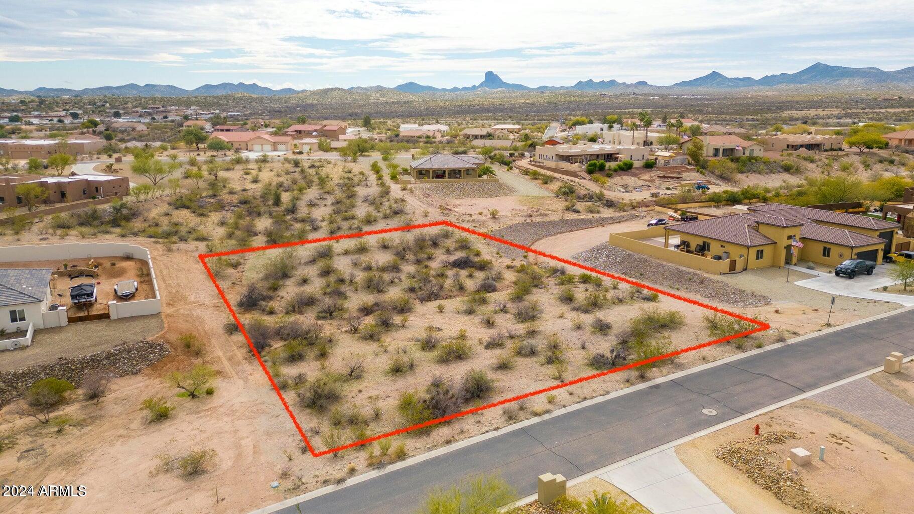 Looking for a great lot in an area of custom homes on paved streets?  Look no further than Saddle Ridge Lot 82!  Slightly under 1ac with north south exposure.  Very gently sloping for what should be a nice easy build.  CC&R's protect the integrity of the neighborhood without any HOA fees.  Paved streets with all utilities either on the property or less than 350' away.  Walk the lot today!